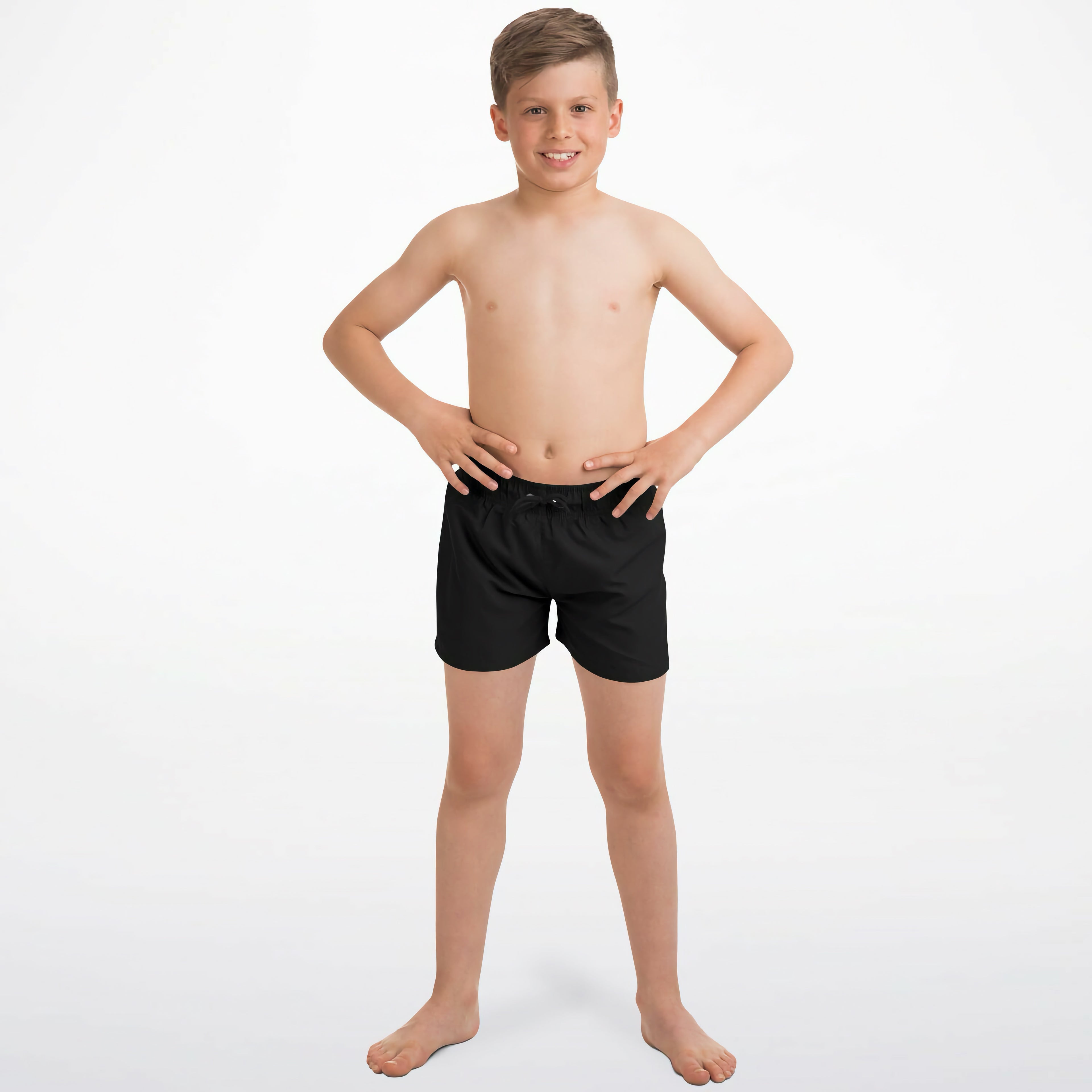 Boys black quick drying swim trunks with a drawstring waistband designed for comfortable swimming use