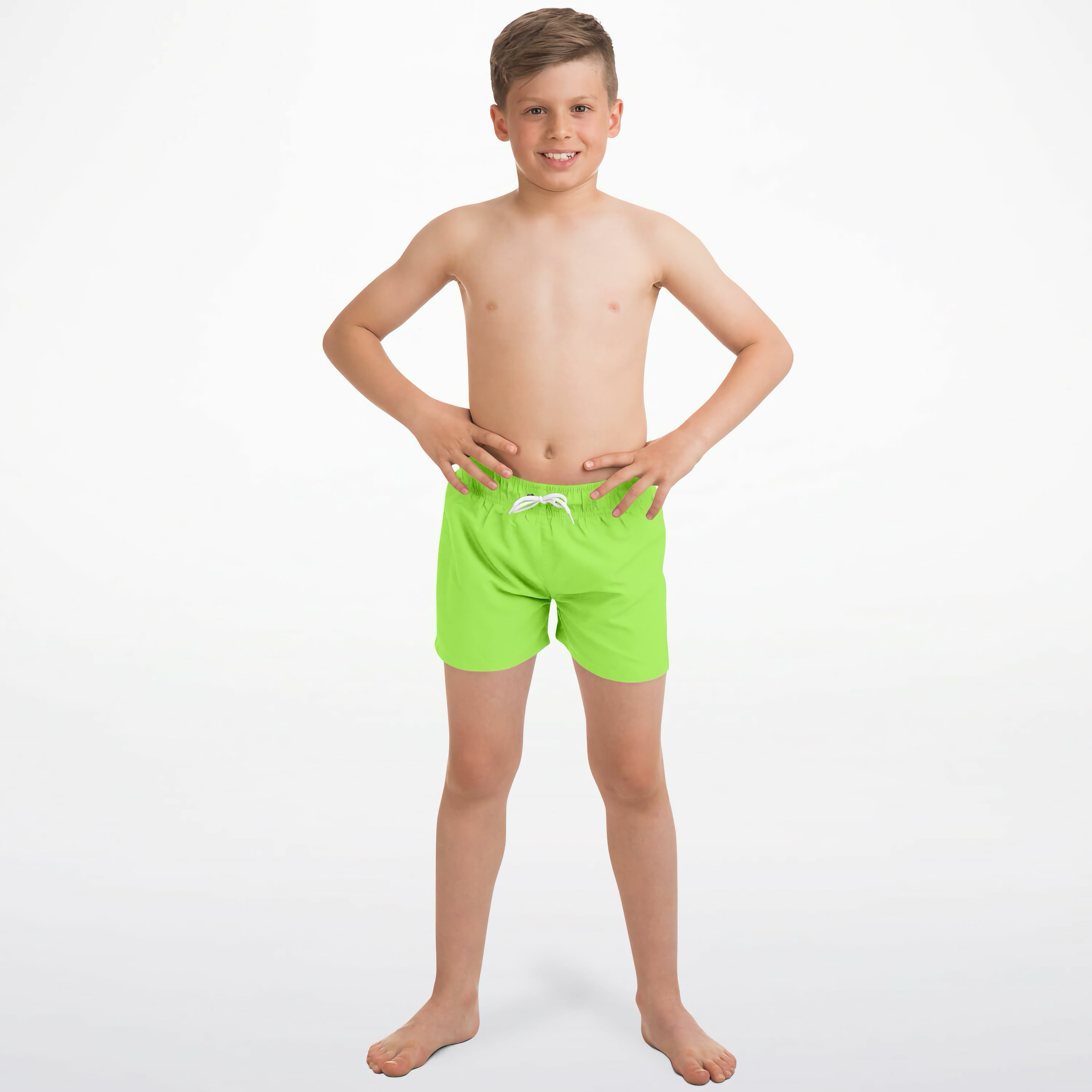 Boys lime green quick drying swim trunks in bright neon green with white drawstrings for water activities