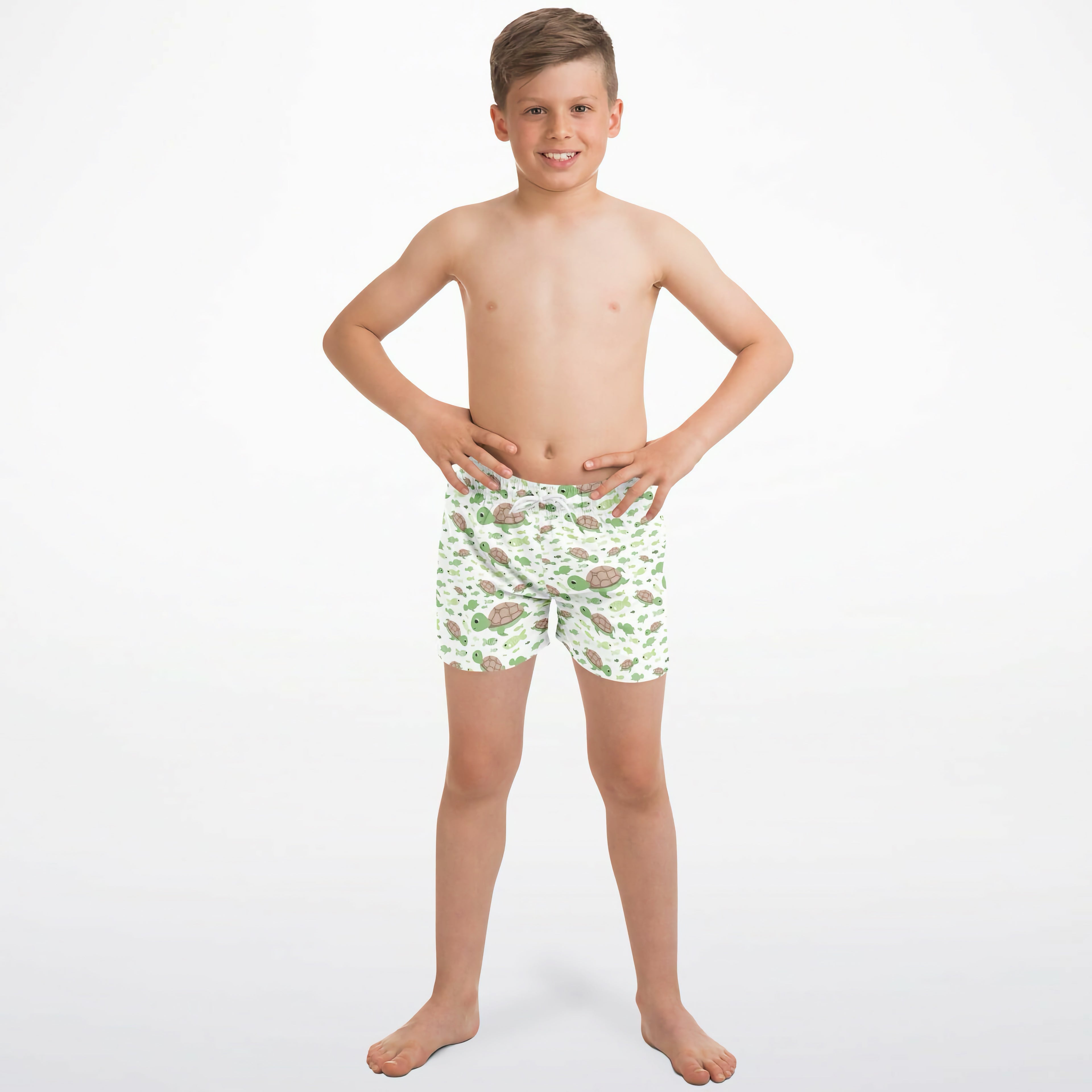 White boys sea turtles quick drying swim trunks with a playful green and brown turtle pattern