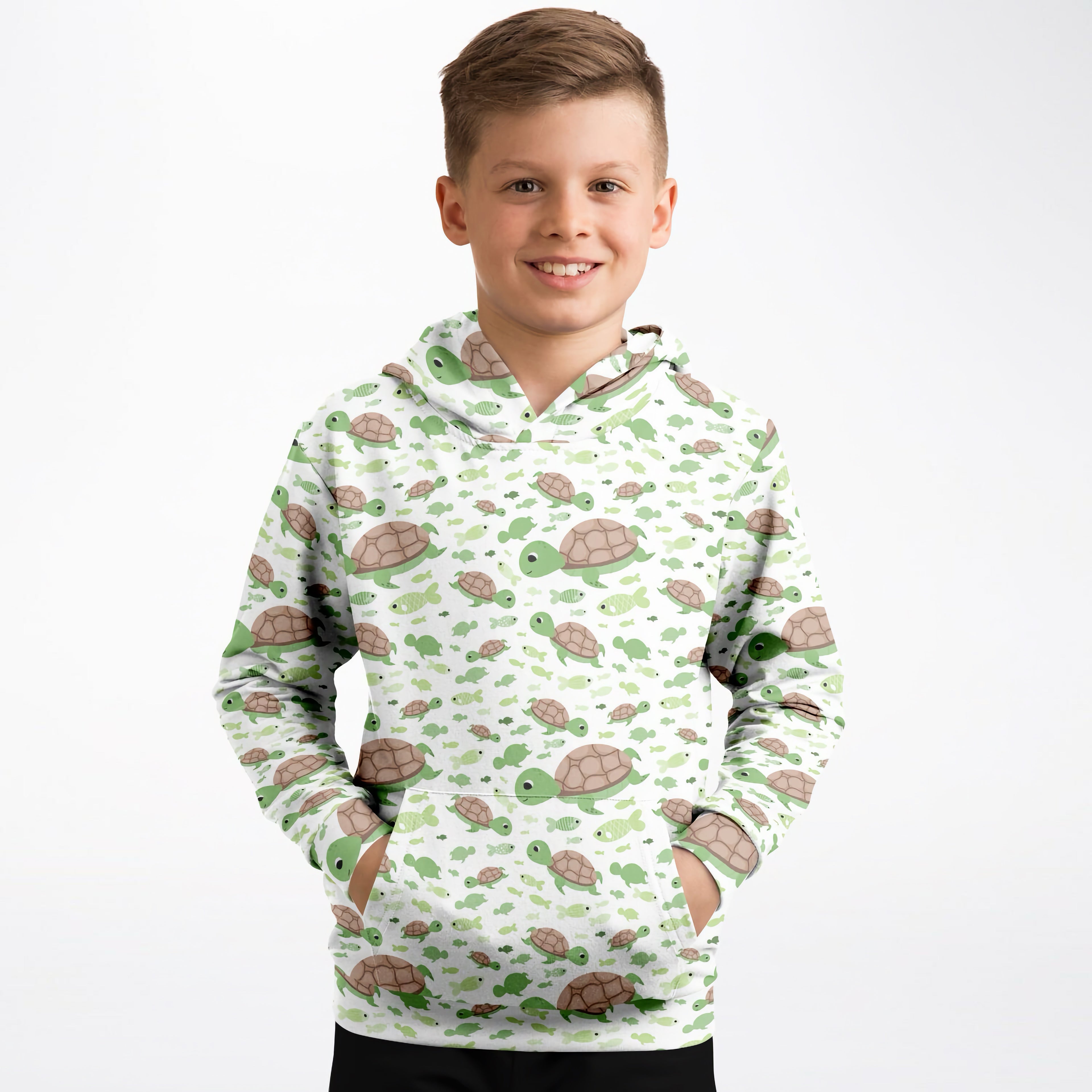 Kids white hoodie with playful green and brown cartoon sea turtles print made of cozy cotton fleece or lightweight sports fabric
