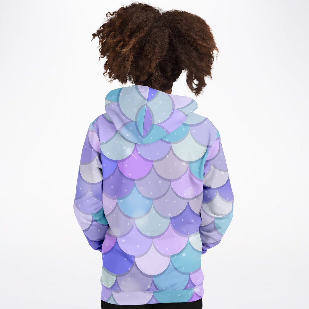 A child wearing a girls purple mermaid hoodie with vibrant full sleeve cotton fleece and mermaid scale print
