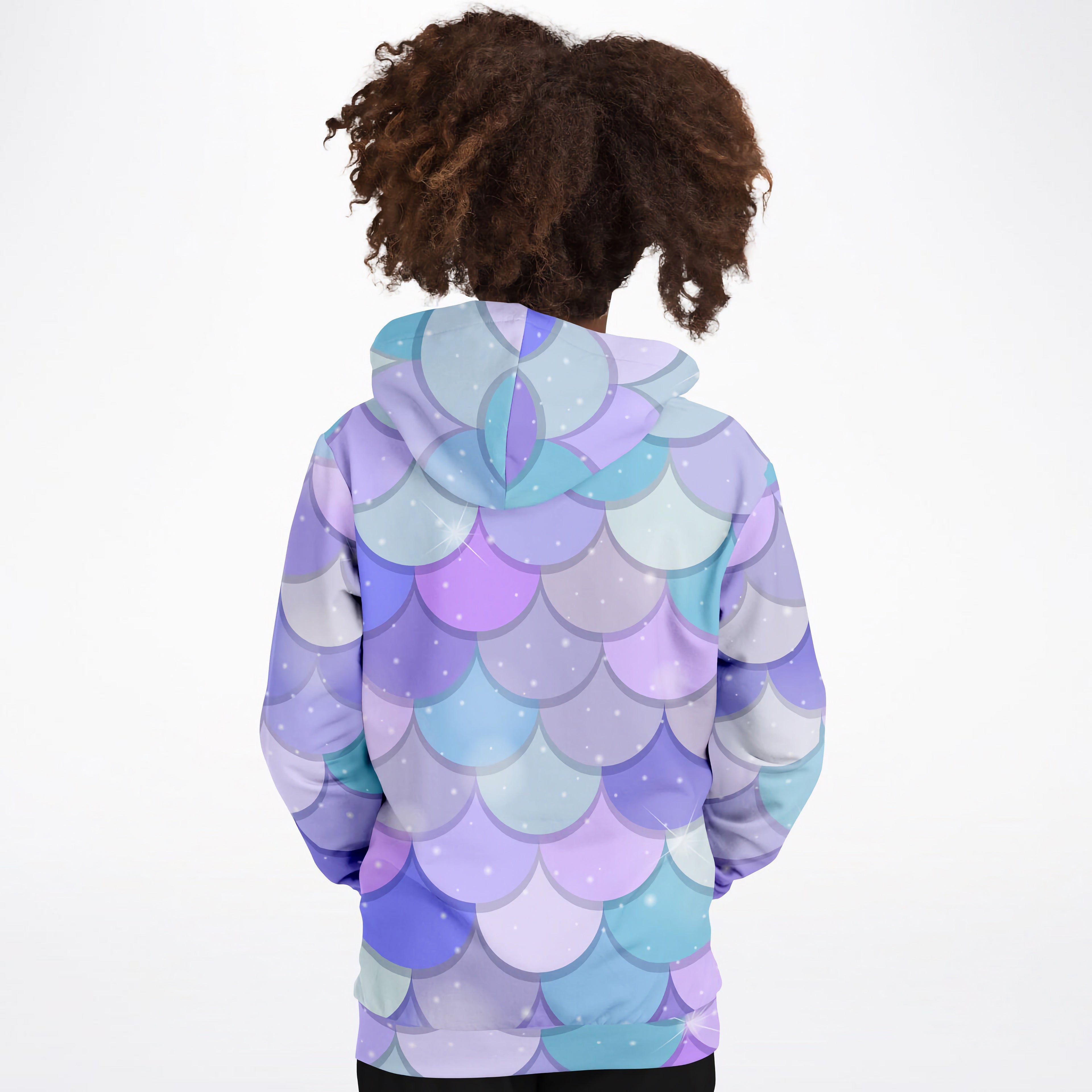 A child wearing a girls purple mermaid hoodie with vibrant full sleeve cotton fleece and mermaid scale print