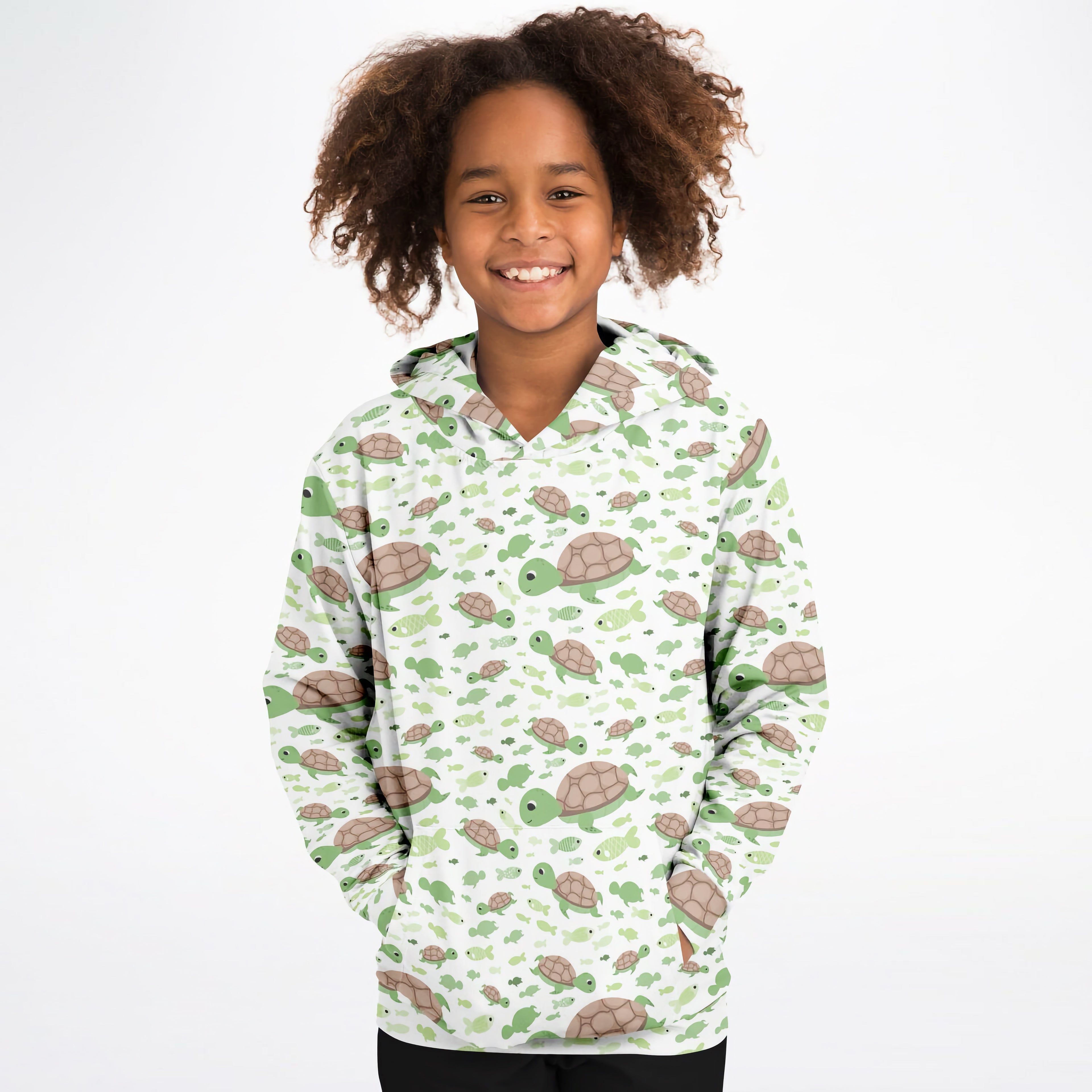 A child wearing a kids green sea turtles hoodie with a playful pattern in cozy cotton fleece fabric