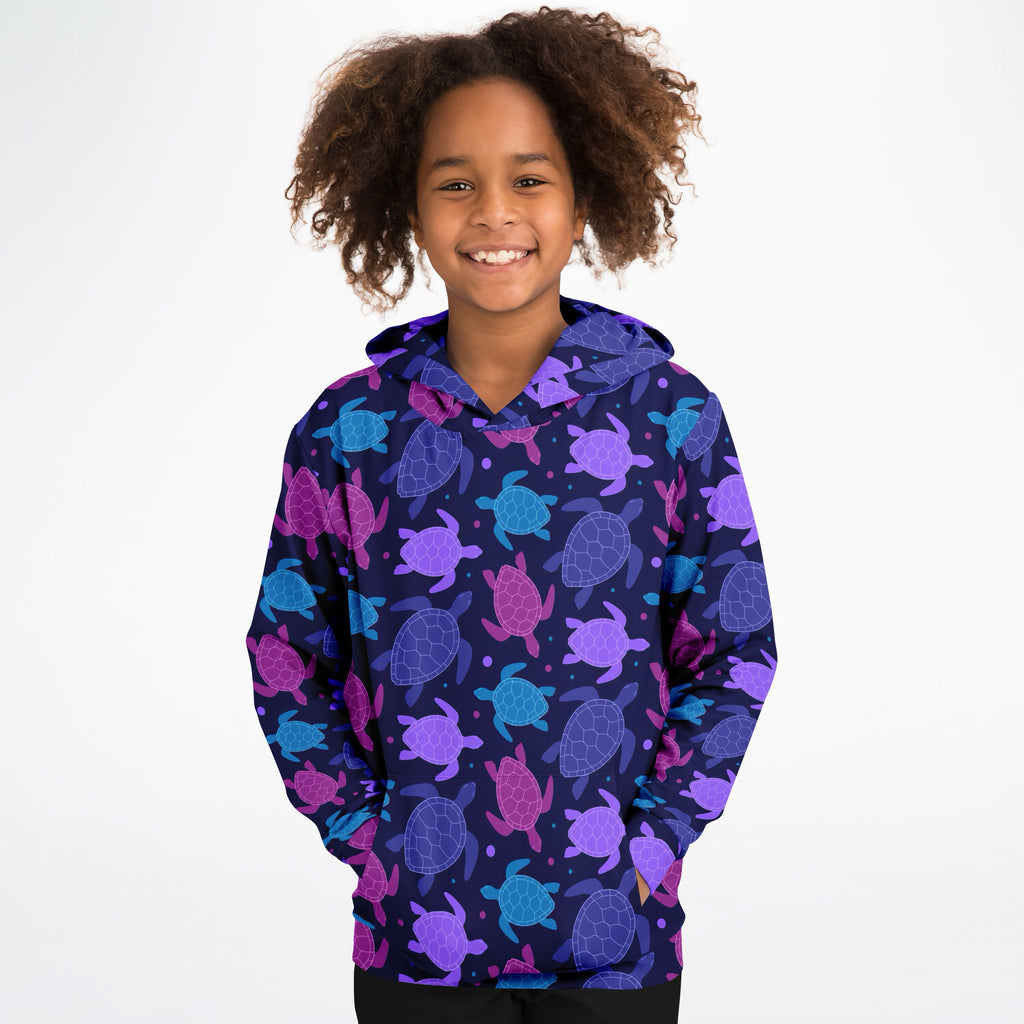 Girls purple sea turtle hoodie in navy blue cotton fleece with vibrant purple and teal sea turtle pattern
