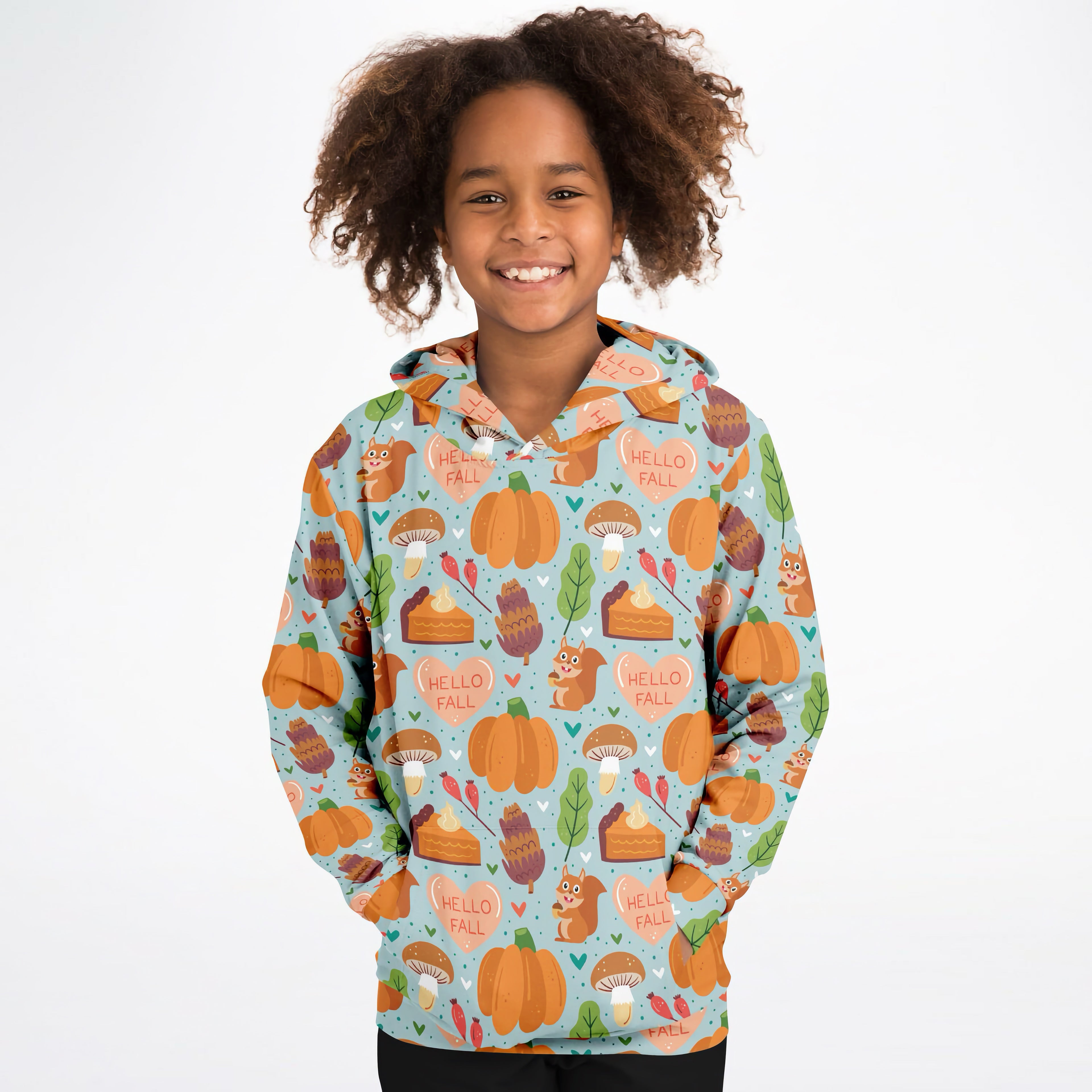 A child wearing a light blue kids hello fall autumn themed hoodie with pumpkins squirrels and cozy cotton fleece