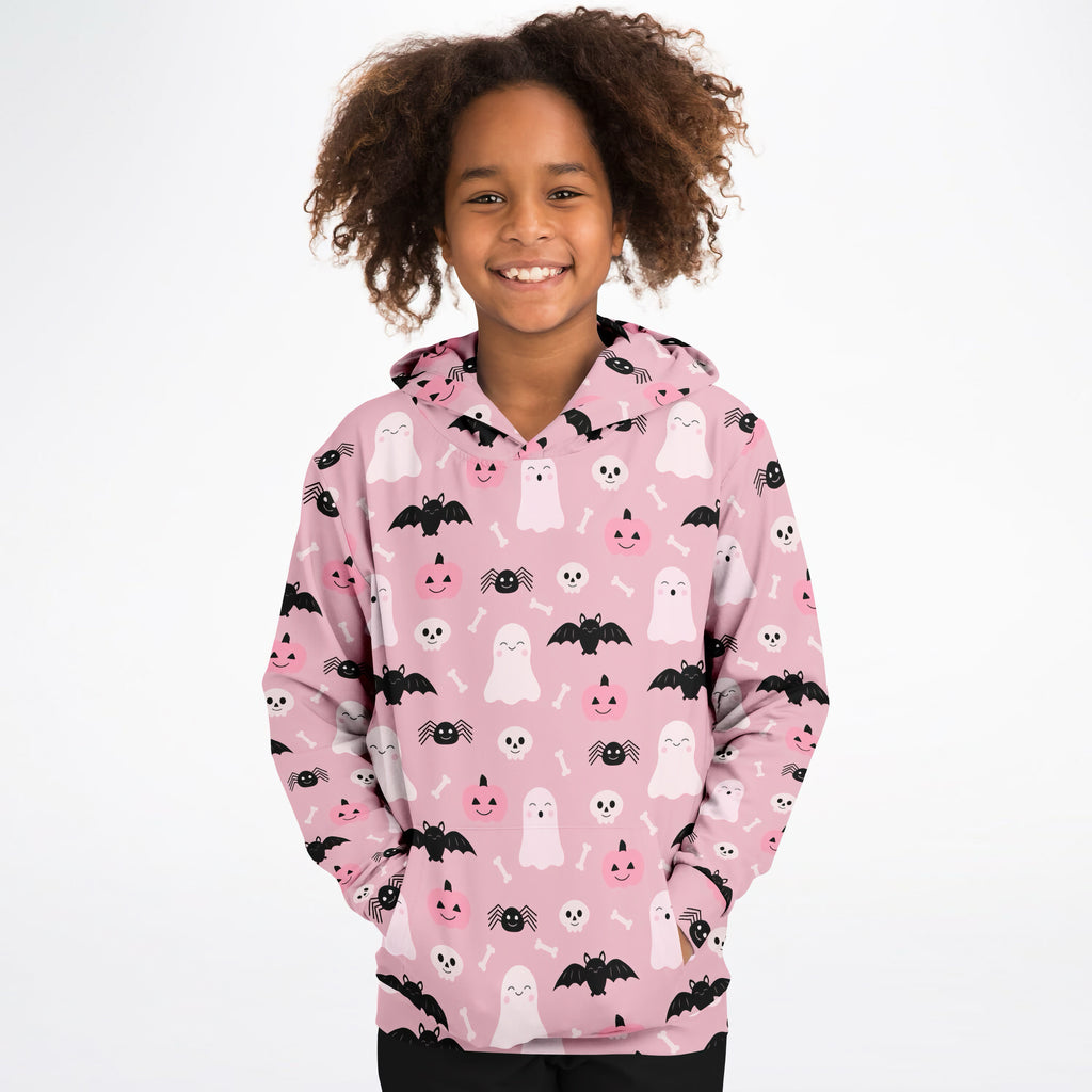 Girls pink halloween hoodie with white ghosts black bats and smiling skulls made of cozy cotton fleece