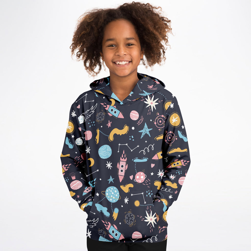 A child wearing a dark navy kids outer space hoodie with colorful cartoon graphics made of cozy cotton fleece