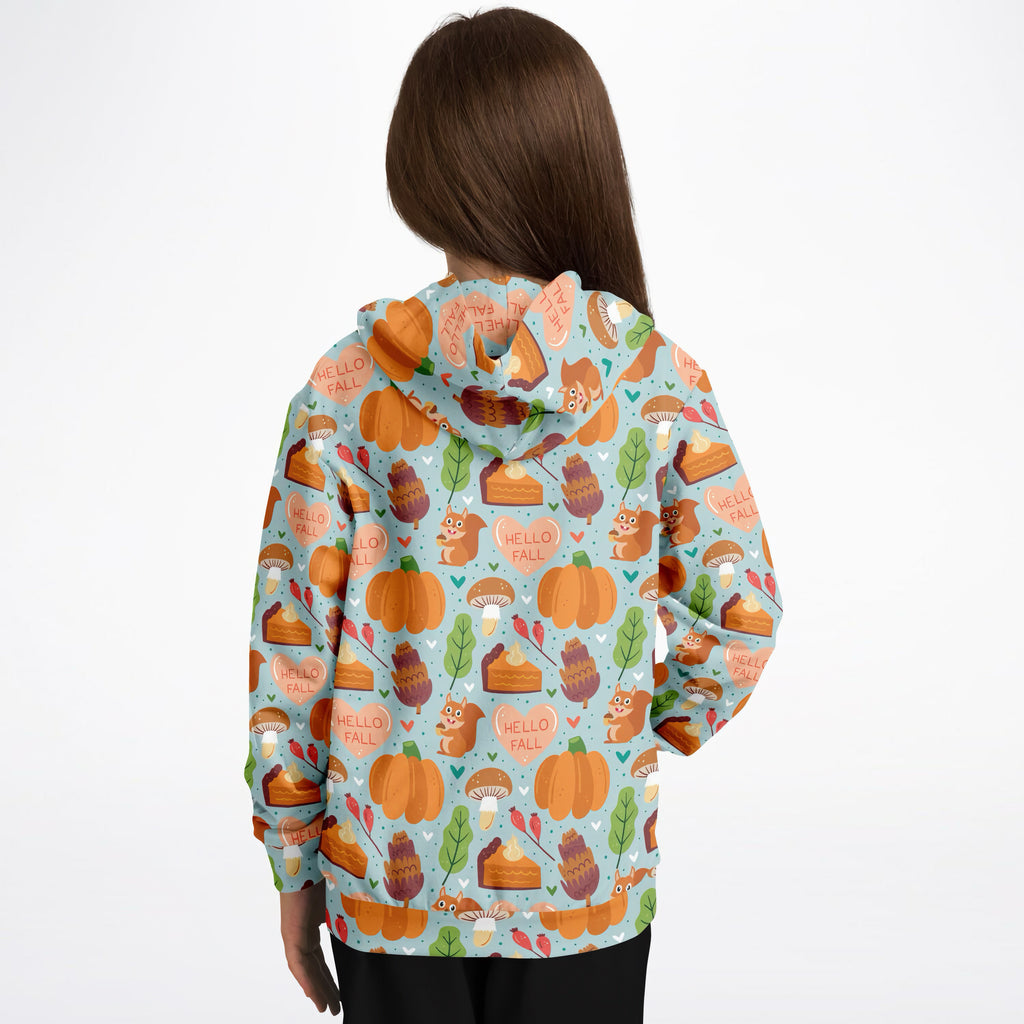 A child wearing a light blue kids hello fall autumn themed hoodie with cozy cotton fleece and pumpkin print