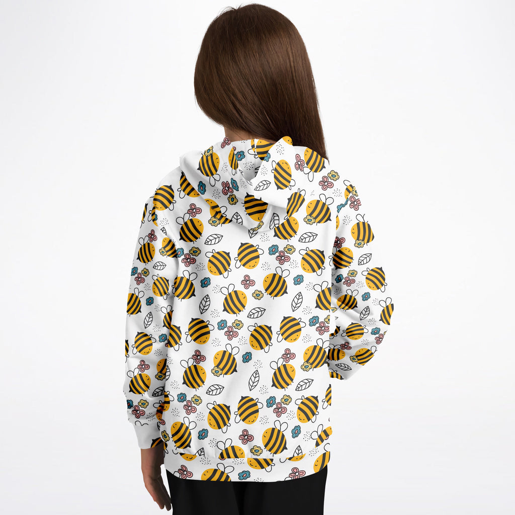 White kids hoodie with playful yellow and black striped bees floral pattern made from cozy cotton fleece fabric