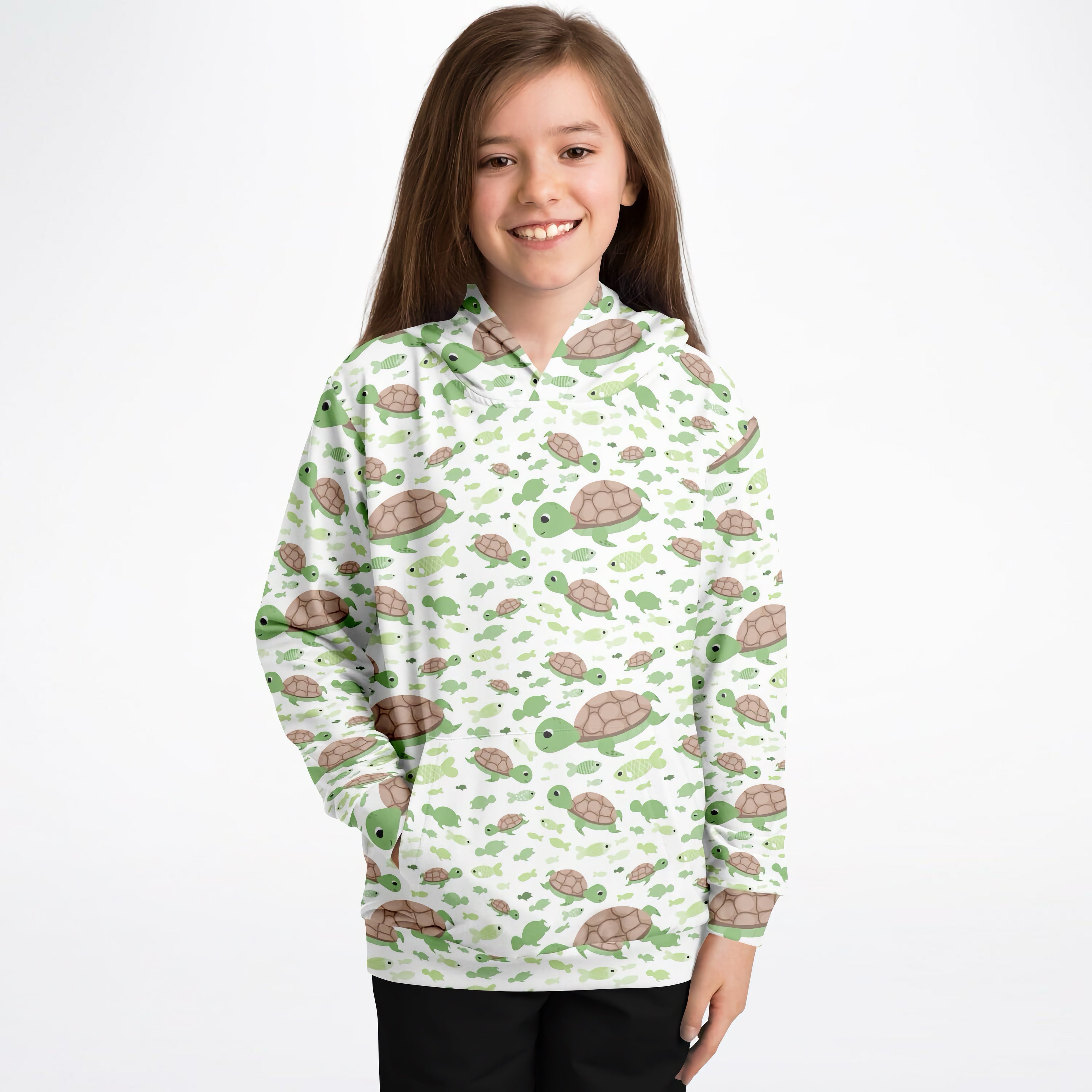 White kids hoodie with playful green and brown sea turtles pattern made of cozy cotton fleece or lightweight sports fabric