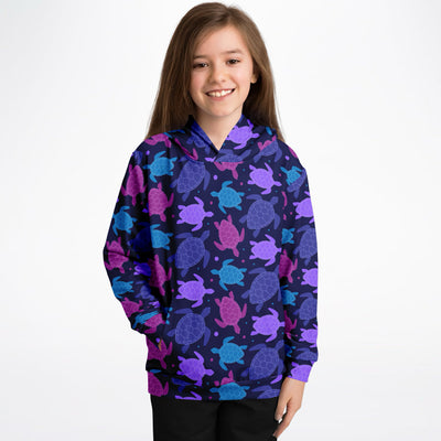 Navy blue girls hoodie with vibrant purple pink teal sea turtle pattern in cozy cotton fleece or lightweight fabric