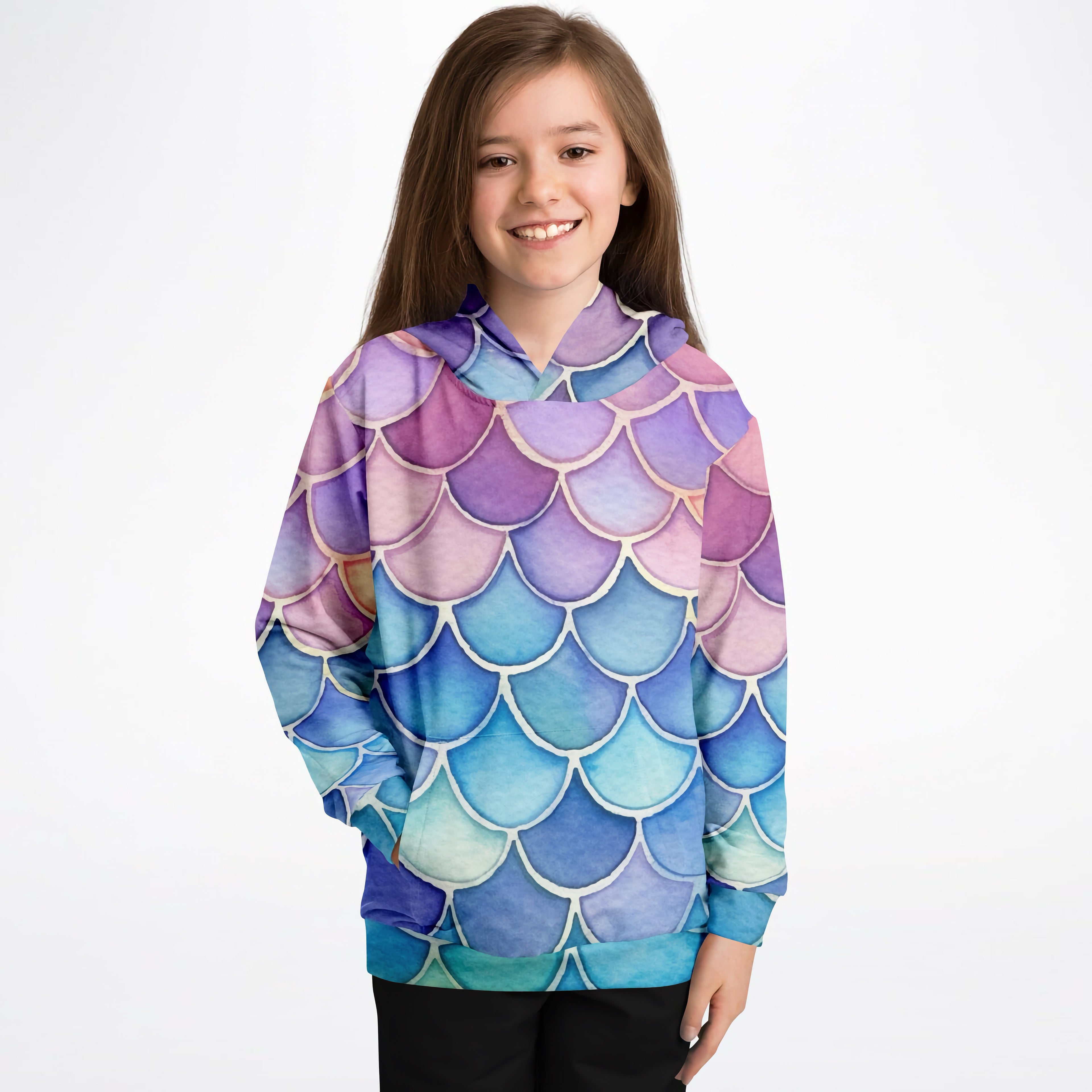 A child wearing a girls watercolor mermaid hoodie with vibrant purple pink blue teal mermaid scales in cozy cotton fleece