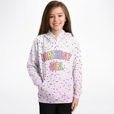Pastel lavender birthday girl hoodie with colorful rainbow sprinkle pattern made of cozy cotton fleece or lightweight fabric