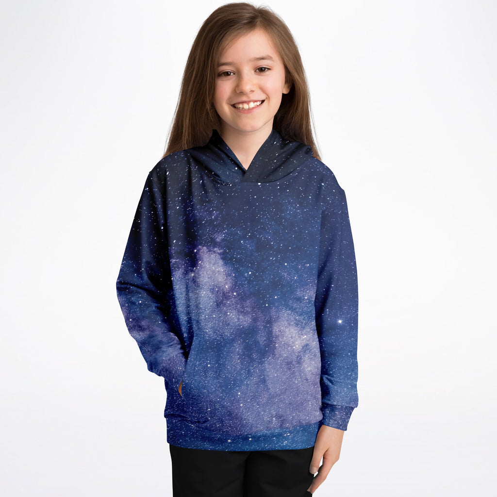 A child wearing a navy blue and purple kids realistic galaxy hoodie with white stars made of cozy cotton fleece