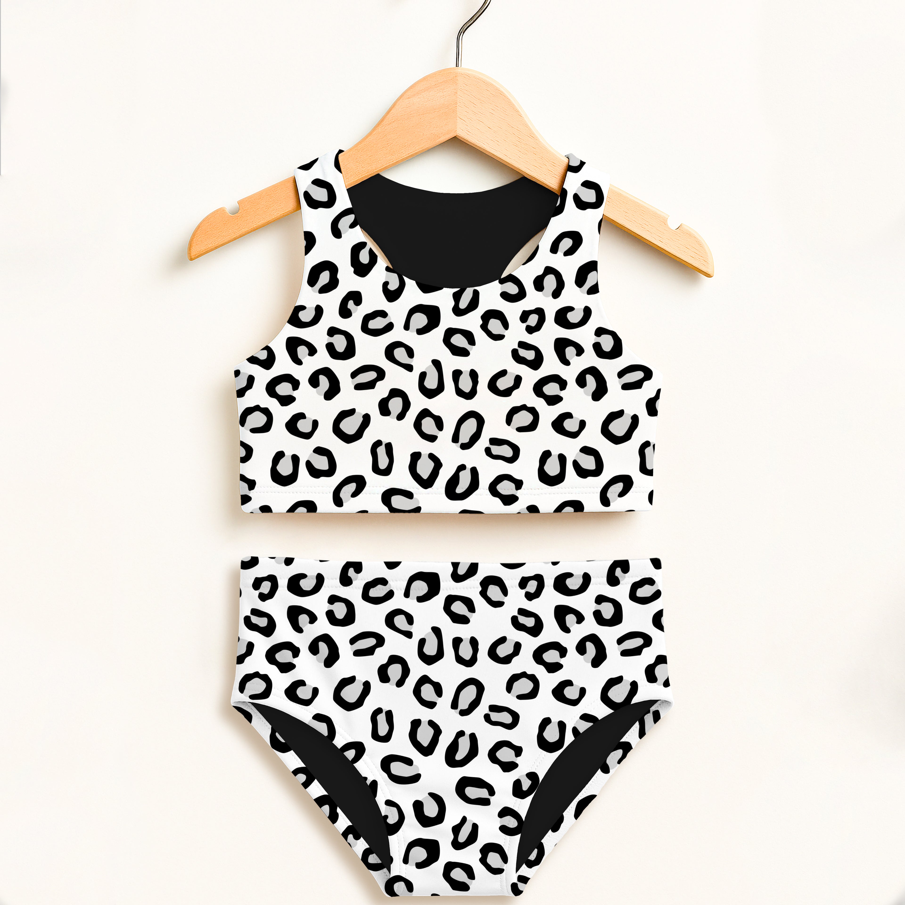 Girls leopard two piece swimsuit with black and white print high waisted bottom and double layered UPF 50+ fabric