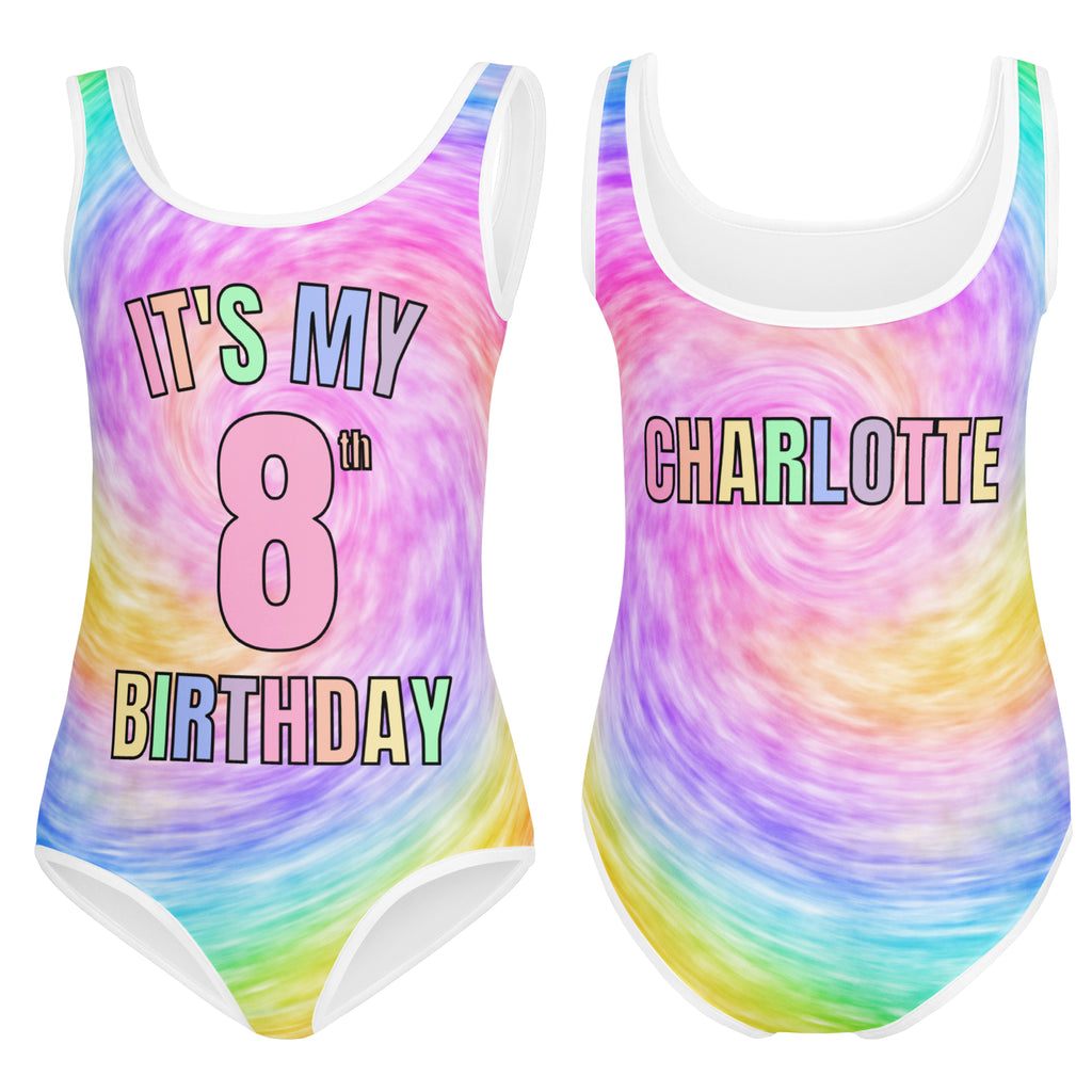 Girls custom age and name rainbow tie dye one-piece swimsuit with white trim for dance and gymnastics showing back side