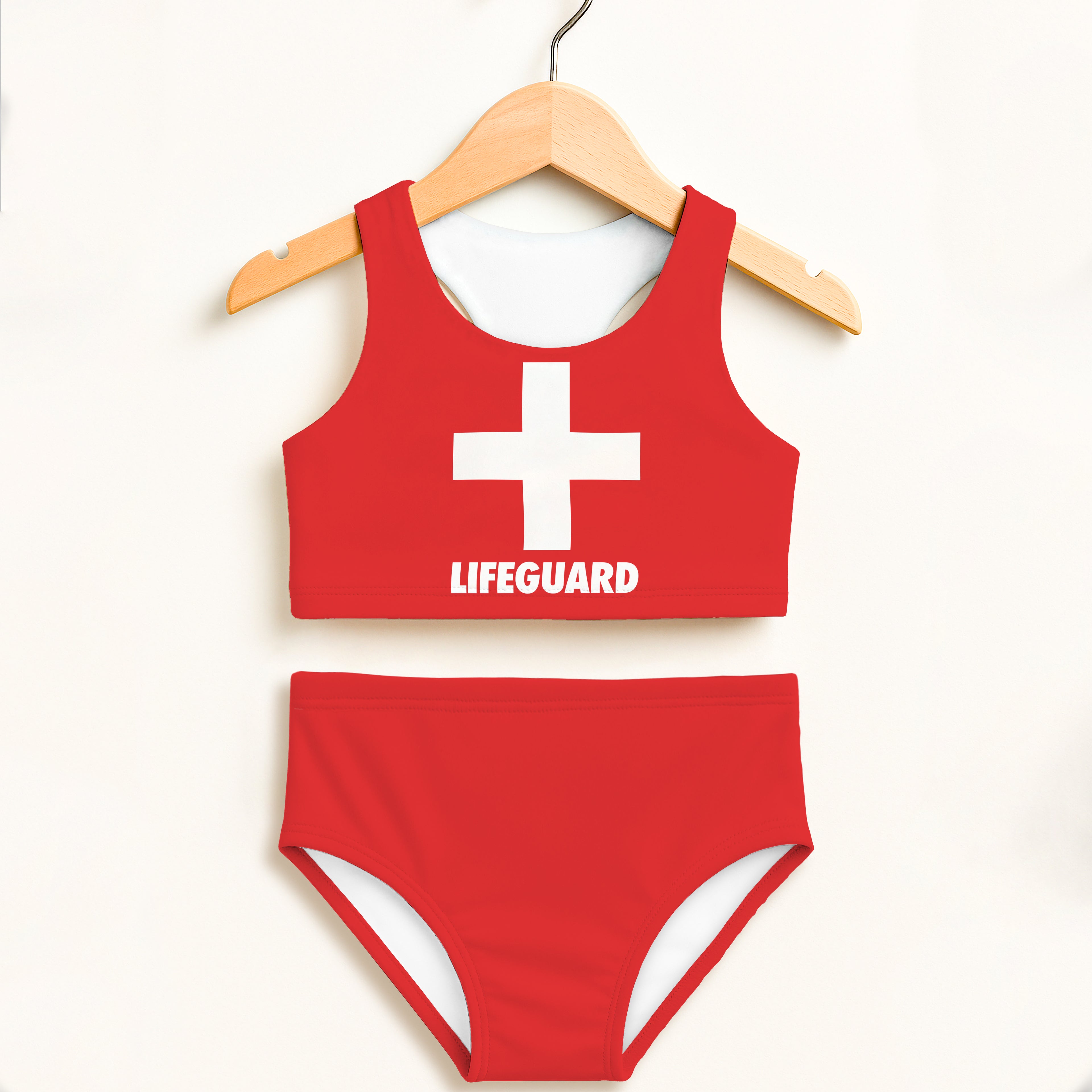 Girls lifeguard two piece swimsuit in red with white cross and text, double layered UPF 50 plus high waisted comfort