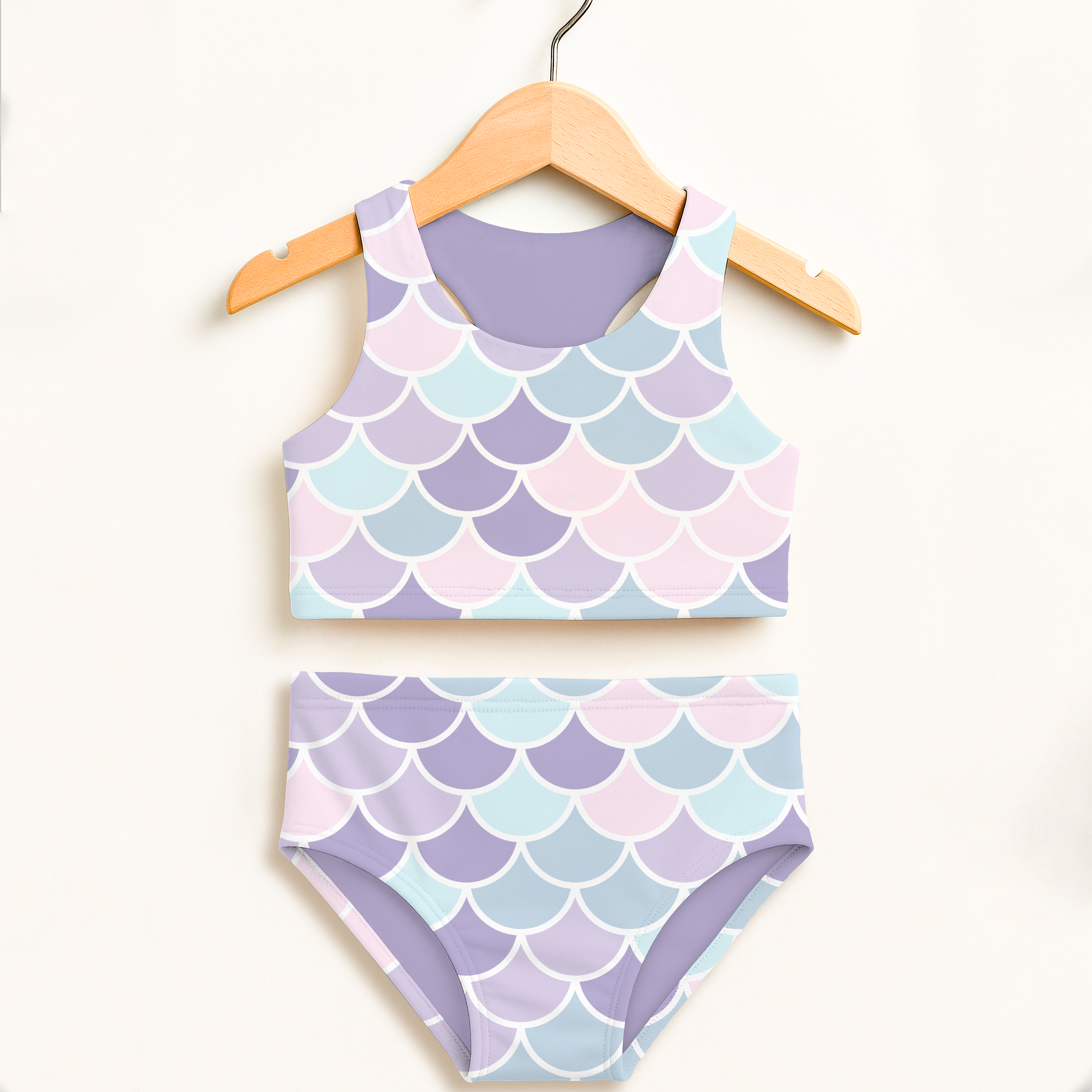 Girls pastel mermaid scale two piece swimsuit in soft lavender light blue and pink hues with upf 50+ high waisted comfort