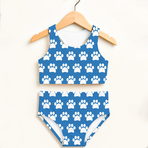 Girls blue two-piece swimsuit with white paw print pattern featuring halter top and high-waisted double layered upf 50+ fabric