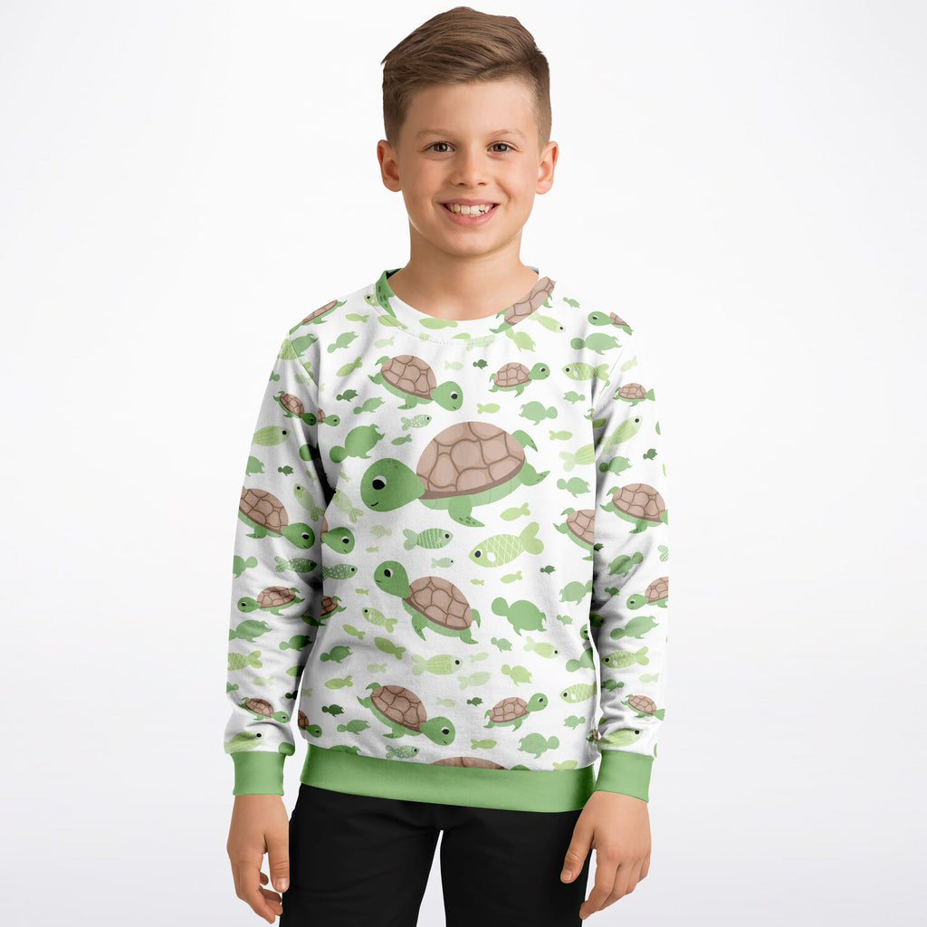 White kids sweatshirt with green sea turtles and fish pattern, light green cuffs, cozy cotton fleece or sports fabric
