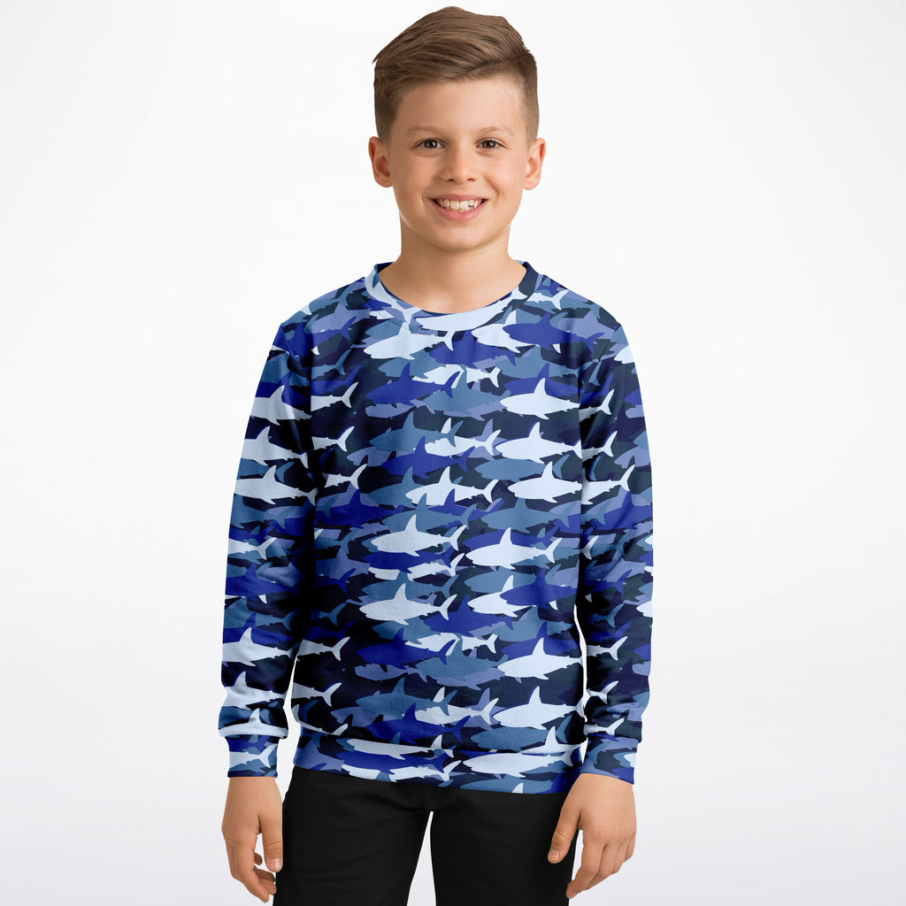 Kids blue shark sweatshirt with blue and white shark pattern made of cozy cotton fleece for comfortable wear