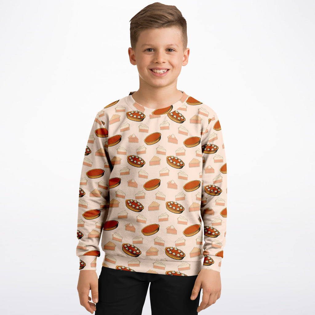 Beige kids pumpkin pie thanksgiving sweatshirt with cartoon pie pattern made of cozy cotton fleece or lightweight fabric