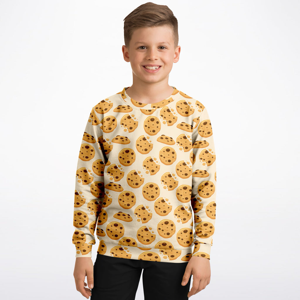 A kids chocolate chip cookies sweatshirt in cozy cotton fleece with playful cookie print on creamy off-white fabric