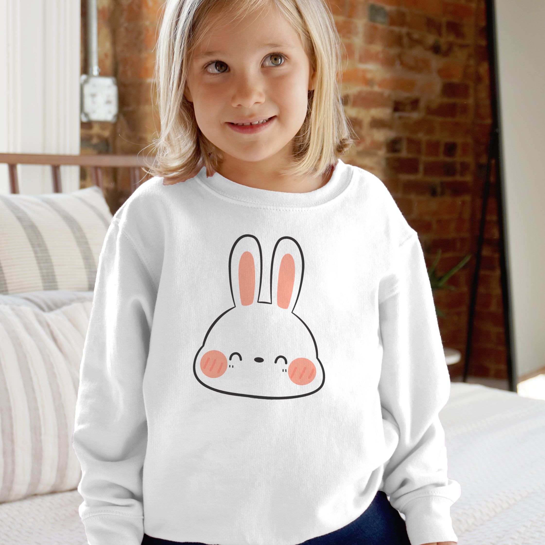 White long-sleeved kids bunny face sweatshirt with cute cartoon rabbit design pink ears and rosy cheeks