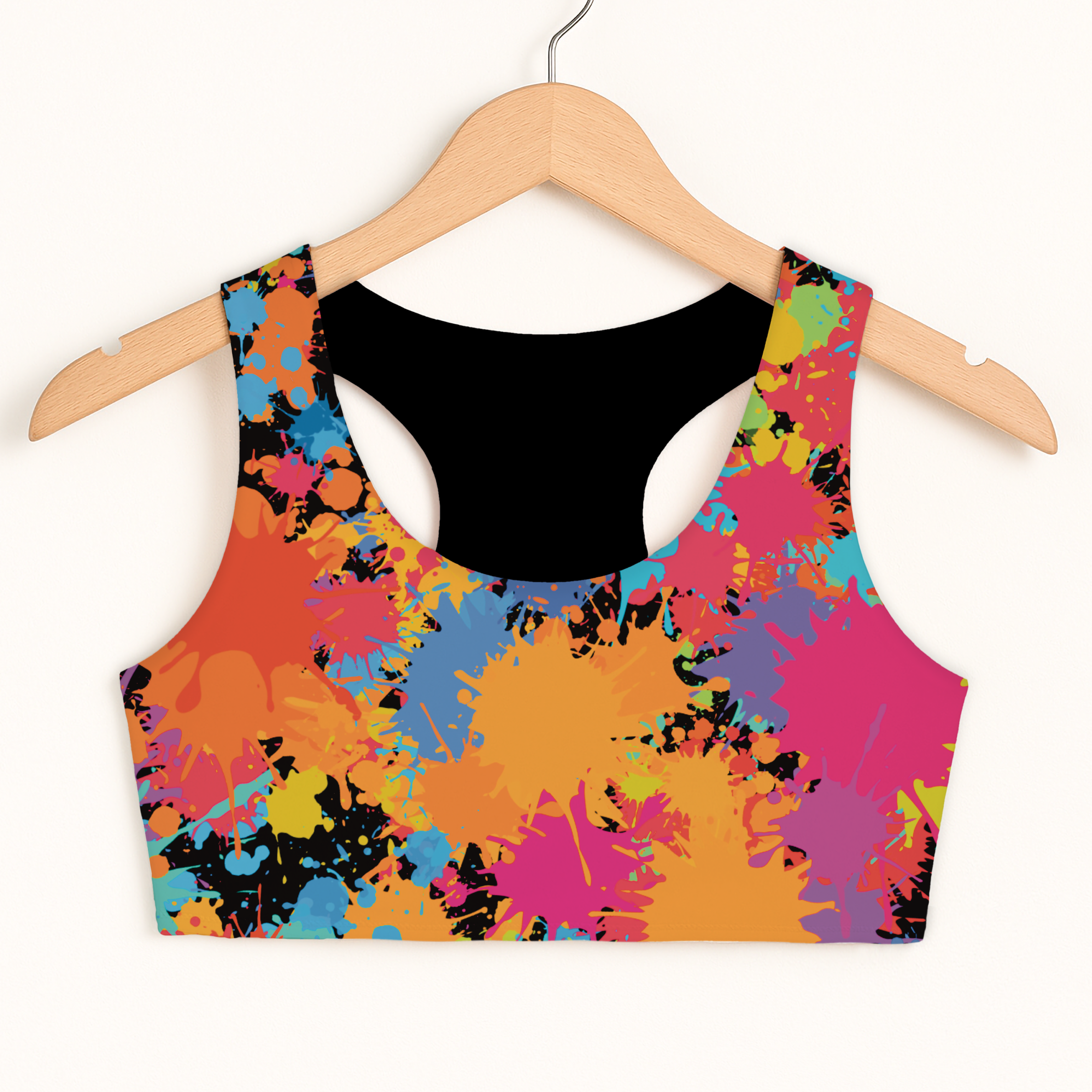 Girls paint splatter sports bra with vibrant colors black racerback quick drying double layered comfort