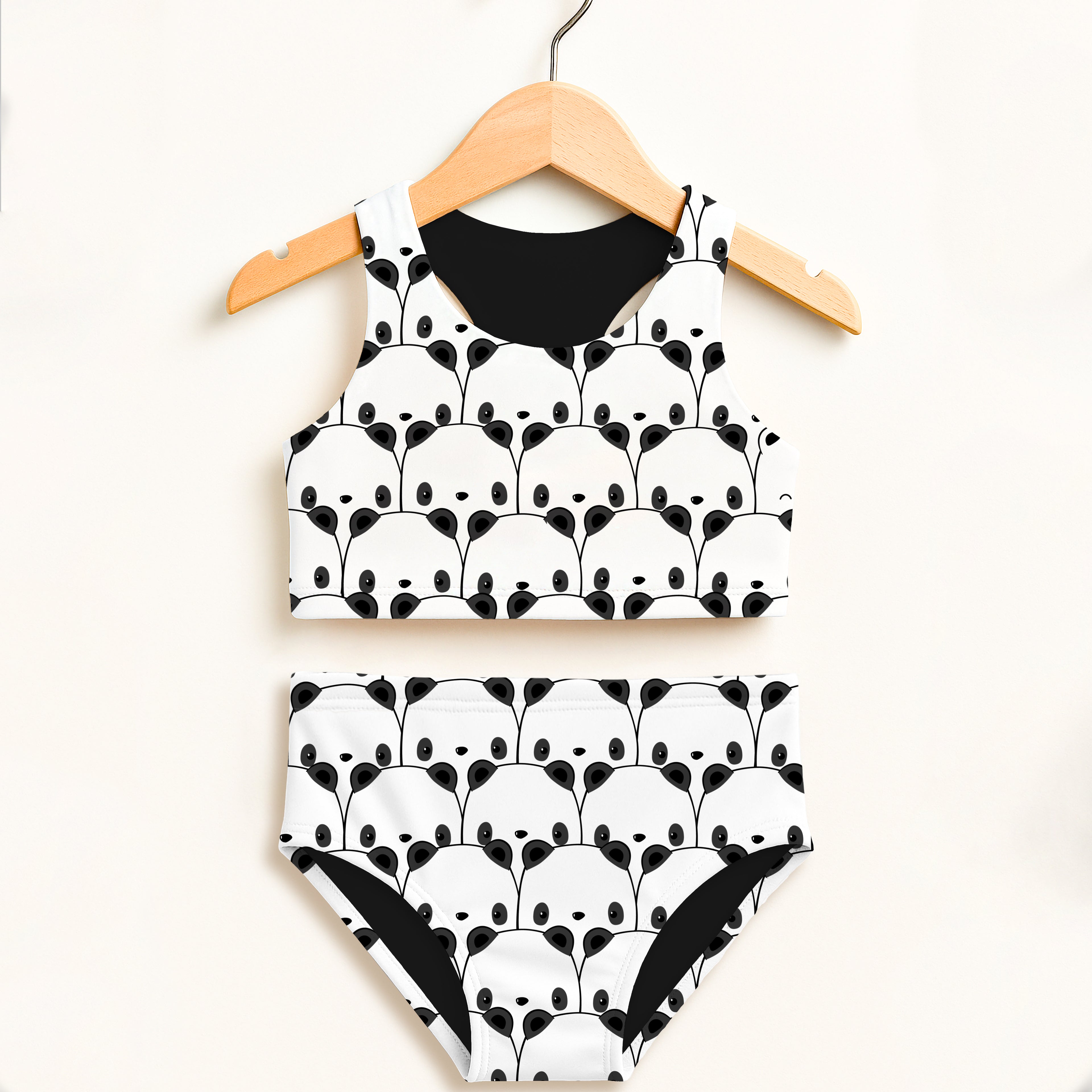 Girls panda two piece swimsuit with black and white panda face pattern and black inner lining high waisted upf 50+