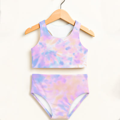 Girls pastel watercolor two piece swimsuit with halter top and high waisted bottoms in lavender pink and blue tie dye