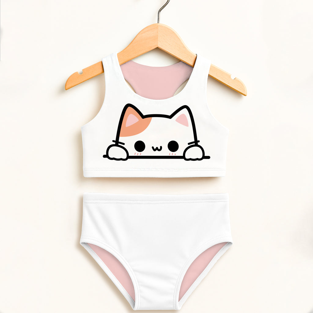 White cat-themed two-piece swimsuit for girls with pink lining black outline and double layered upf 50+ high waisted design
