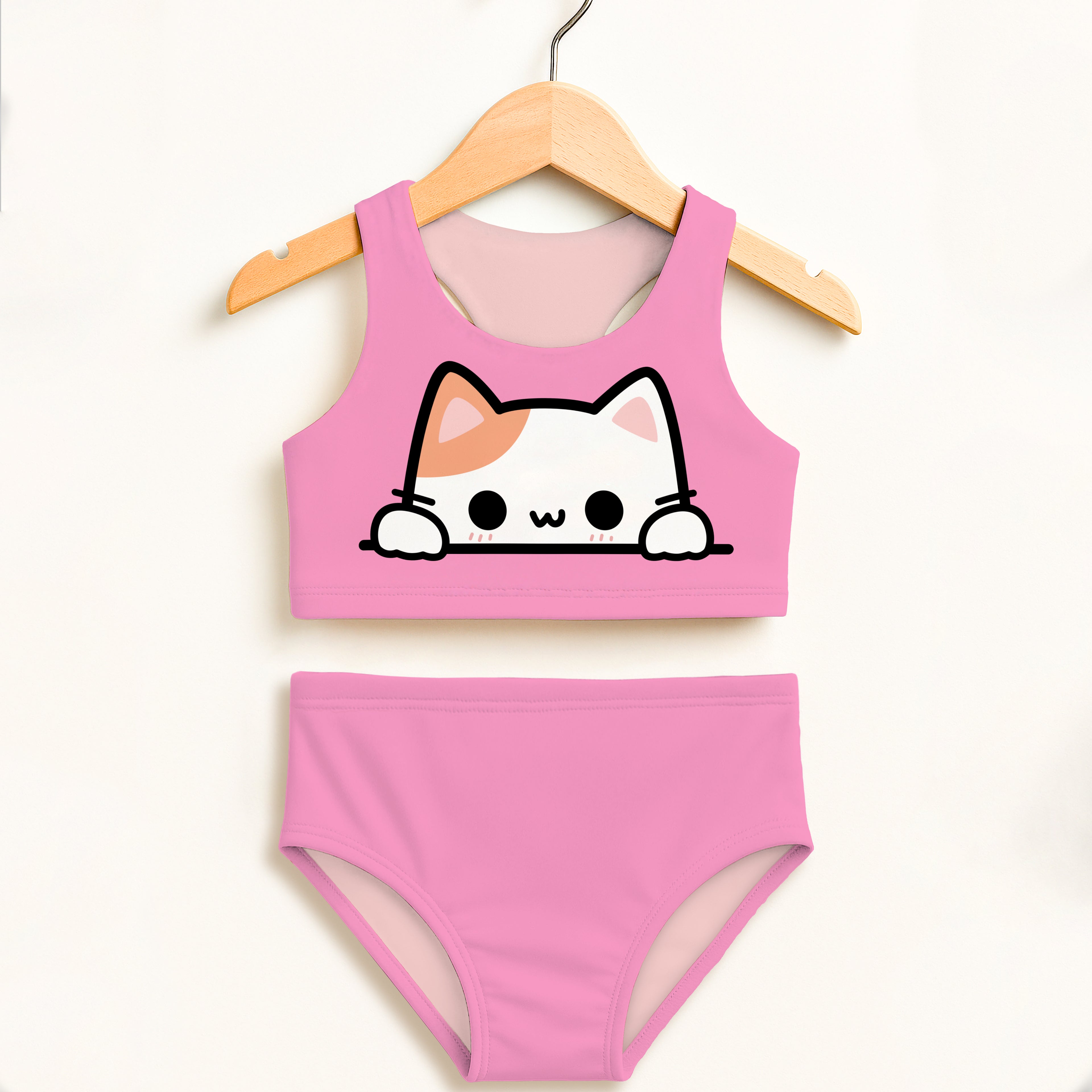 Pink girls two-piece swimsuit with double layered high waisted comfort and cute cartoon cat design on the top
