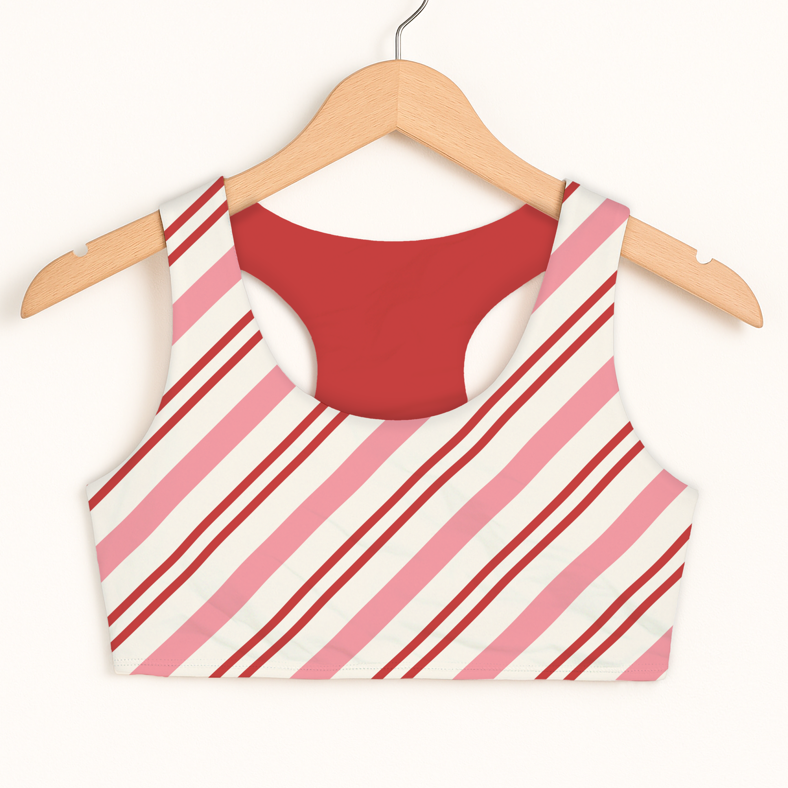 Girls pink candy cane Christmas sports bra with pink and white stripes red interior quick drying double layered comfort