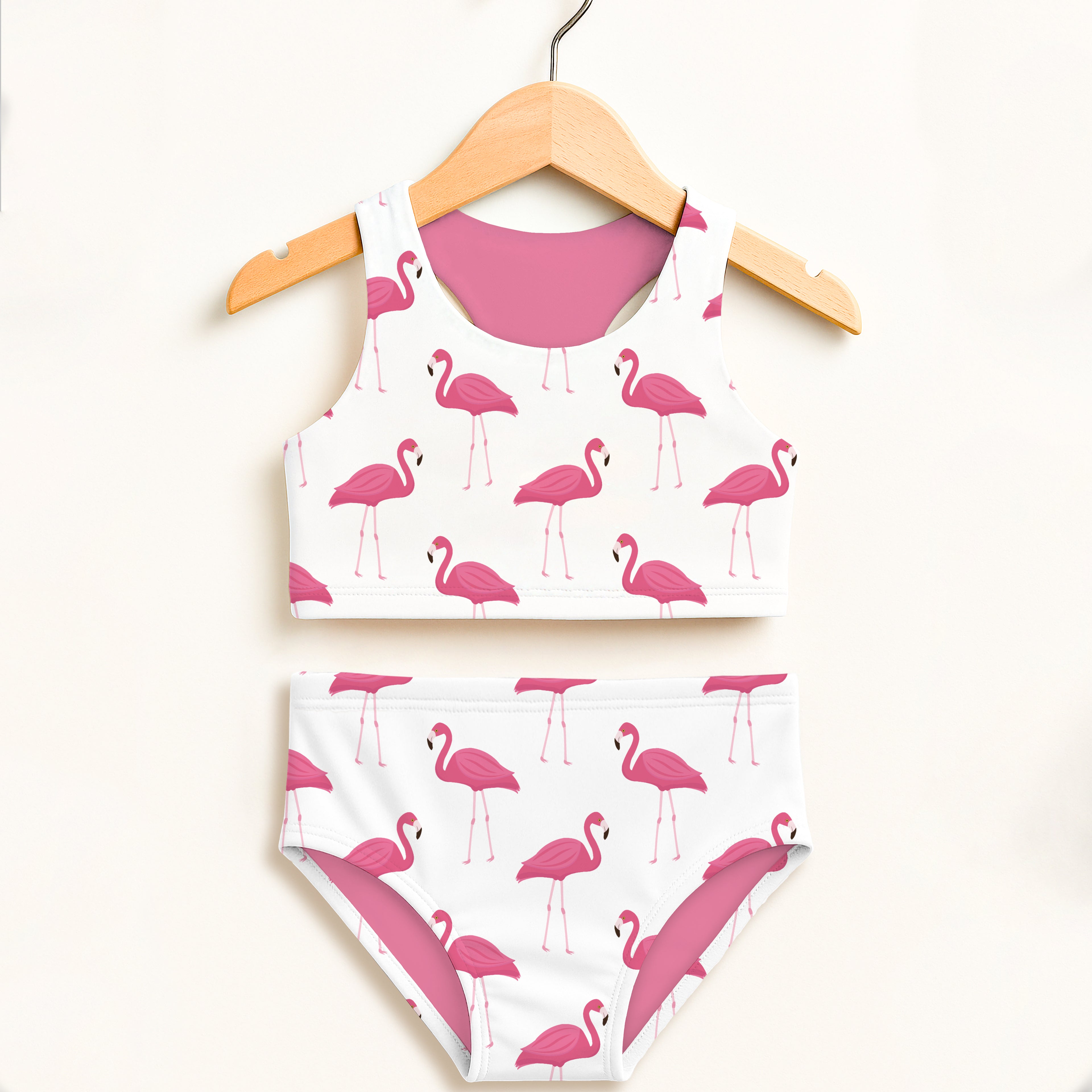 Girls pink flamingo two piece swimsuit with white fabric pink inner lining double layered upf 50 high waisted comfort
