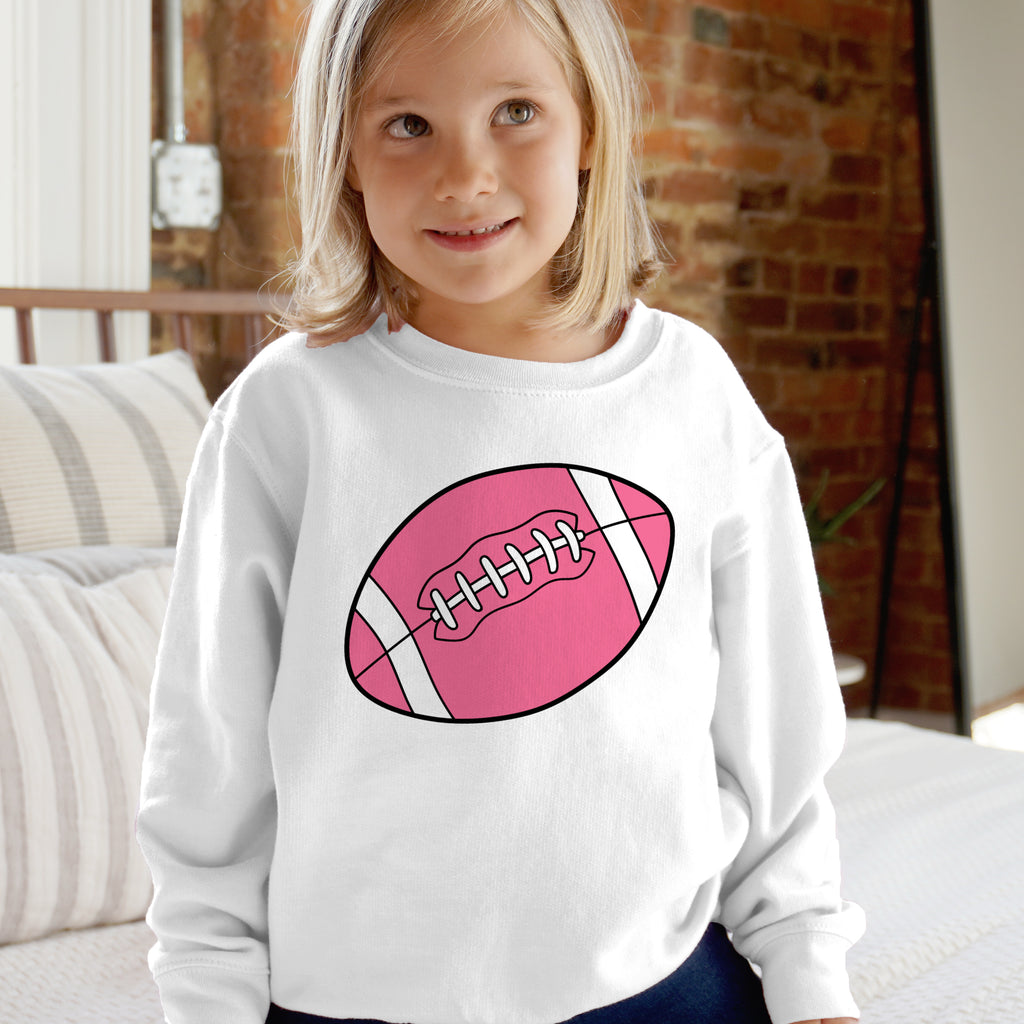 White long-sleeved kids sweatshirt with a pink cartoon football graphic perfect for girls sportswear