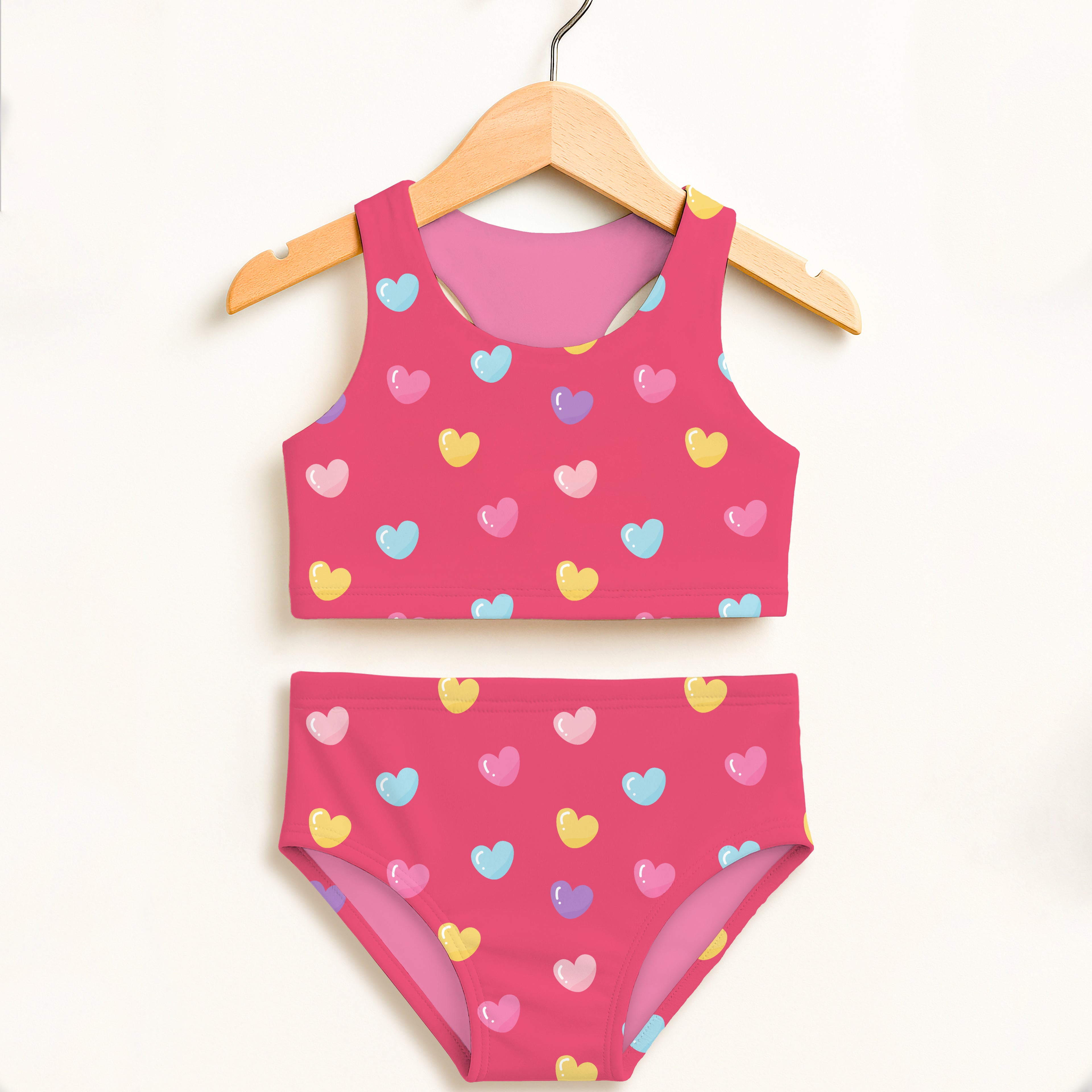 Girls pink pastel hearts two piece swimsuit with double layered upf 50 high waisted comfort and colorful hearts