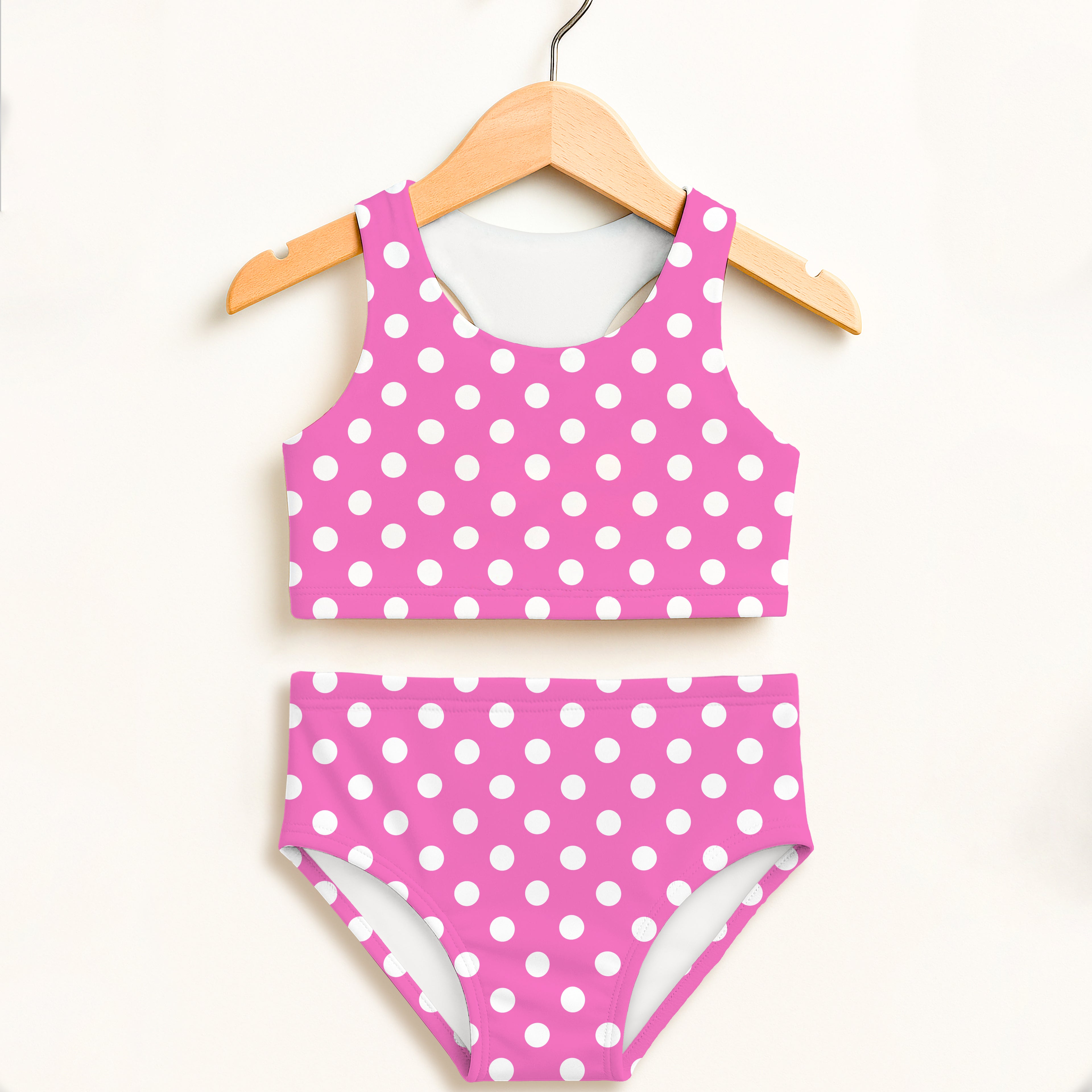 Girls pink polka dot two piece swimsuit with white dots racerback top double layered upf 50+ comfort