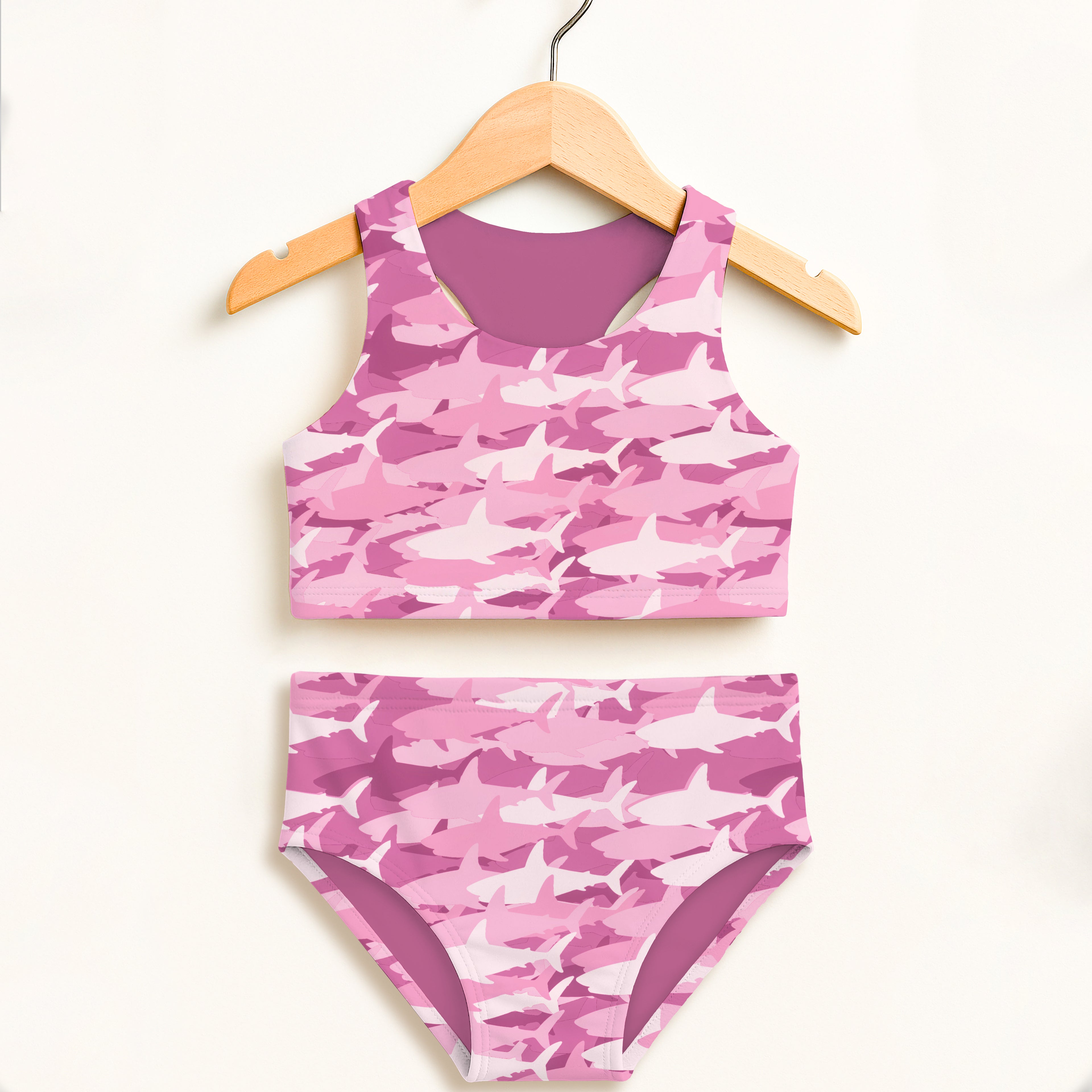 Girls pink shark camouflage two piece swimsuit with double layered fabric and UPF 50 plus high waisted comfort
