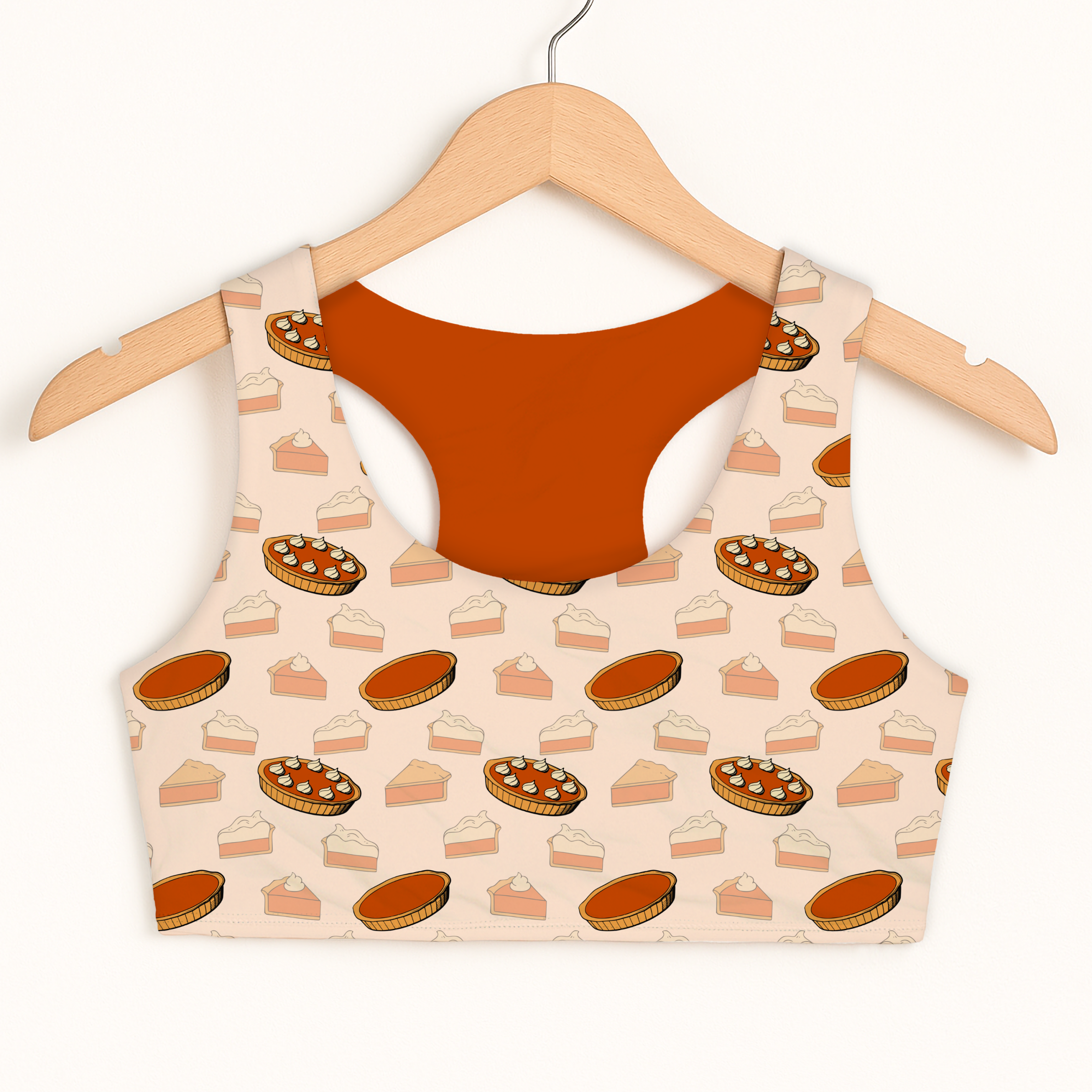 Beige girls pumpkin pie thanksgiving sports bra with playful pie pattern orange inner lining quick drying comfort