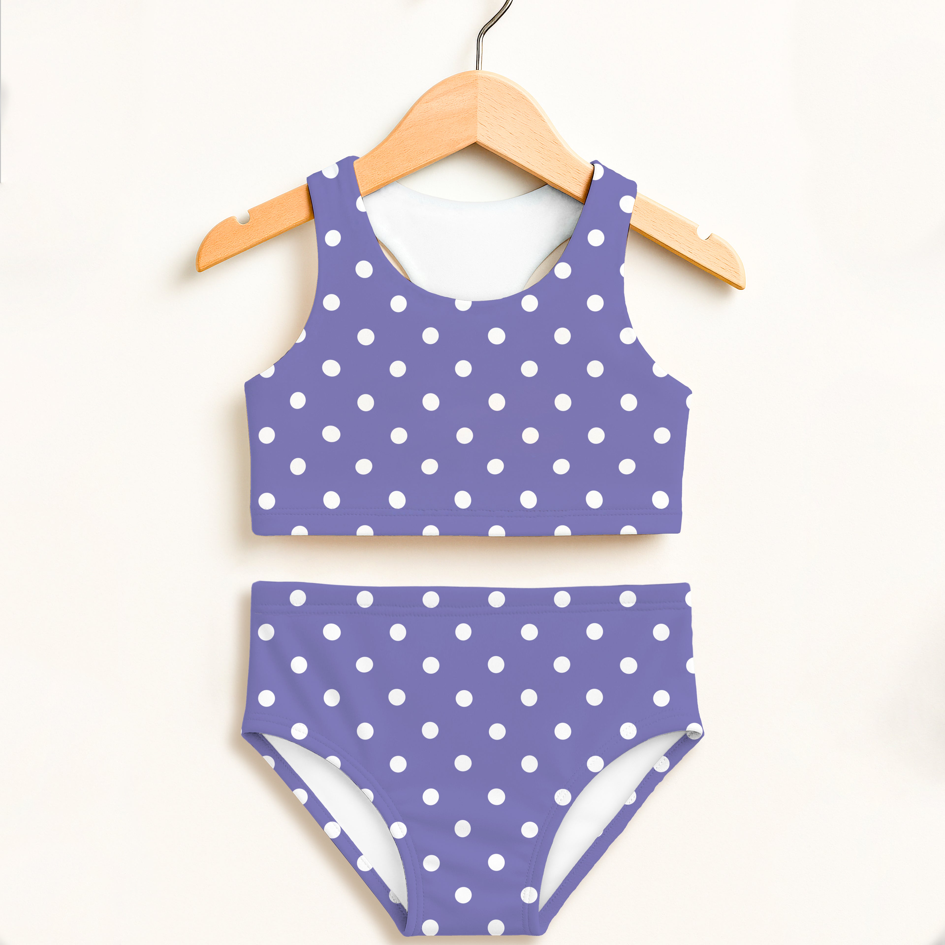 Girls purple polka dot two piece swimsuit with white dots racerback top double layered upf 50+ high waisted comfort
