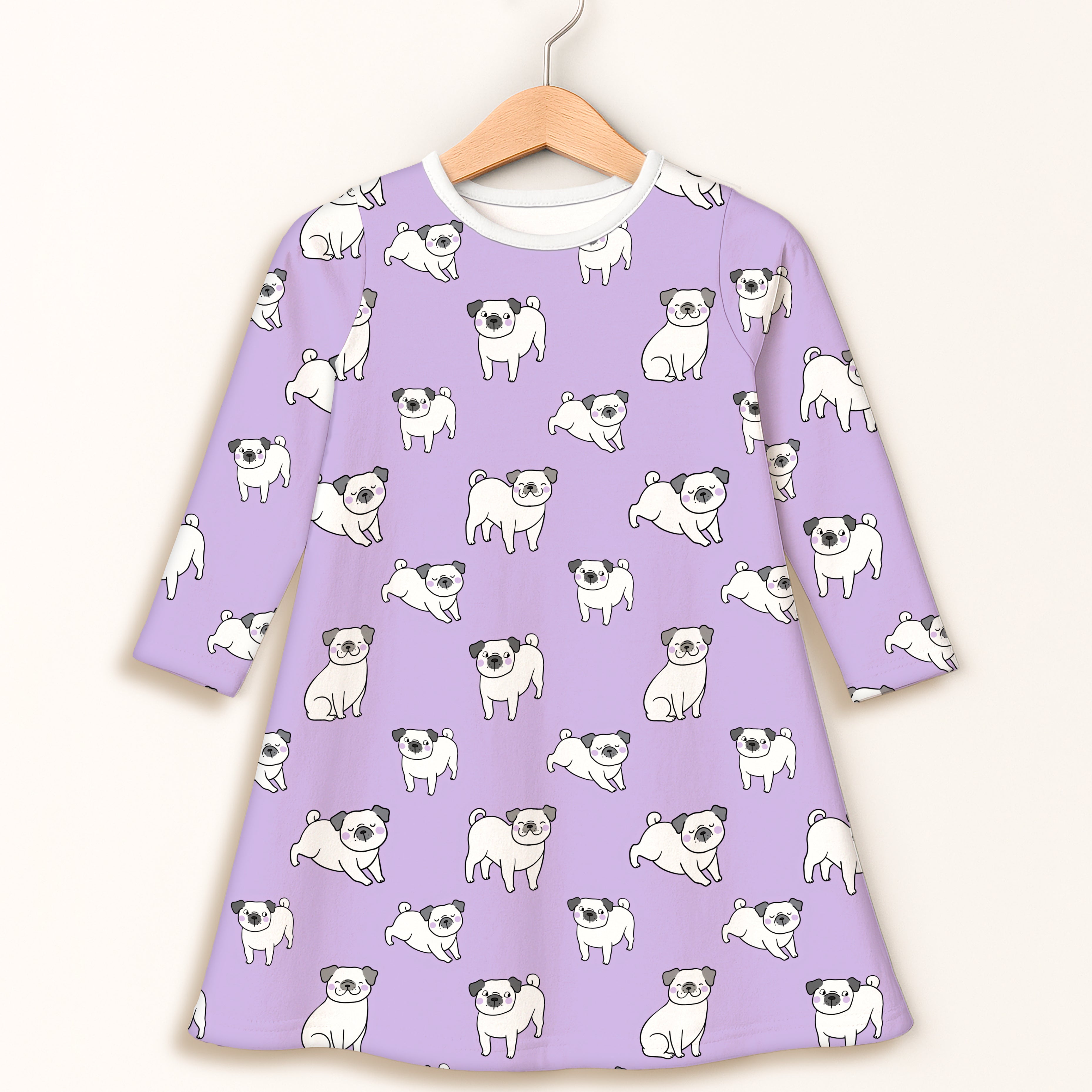 Girls purple pug long sleeve dress in lavender with white cartoon pugs featuring black ears and noses