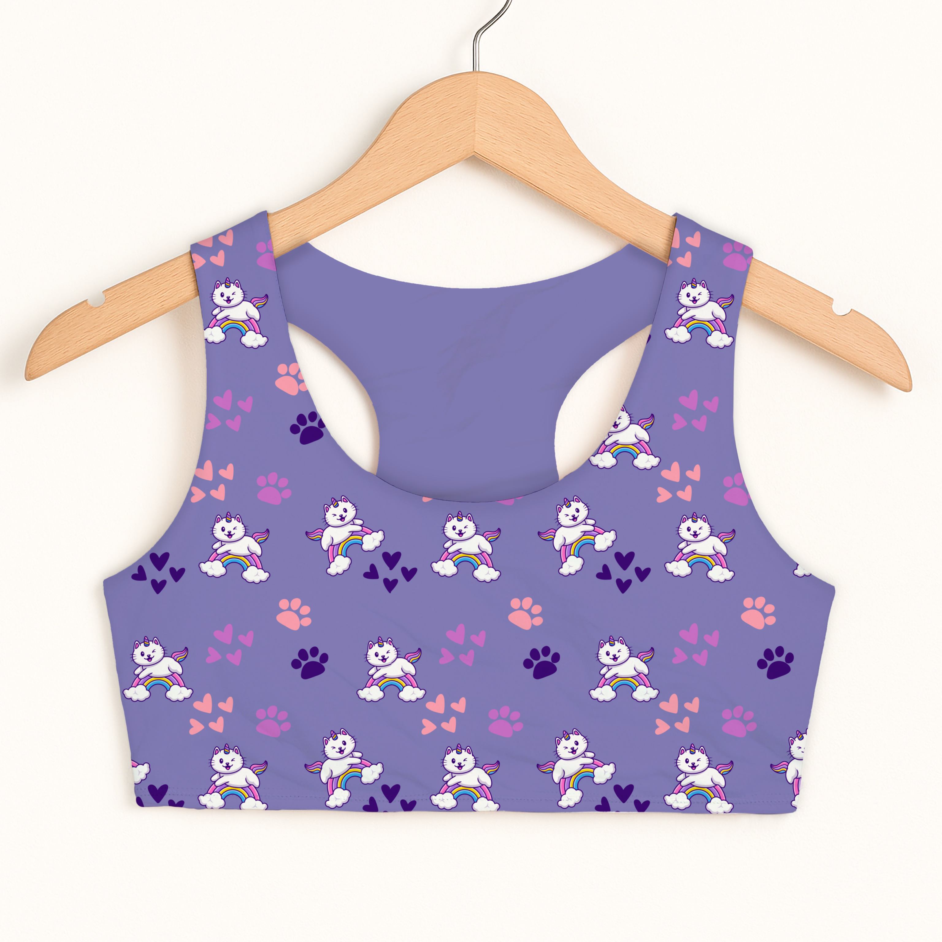 Girls purple caticorn sports bra with white winged cat pattern rainbow arcs and paw prints quick drying double layered comfort