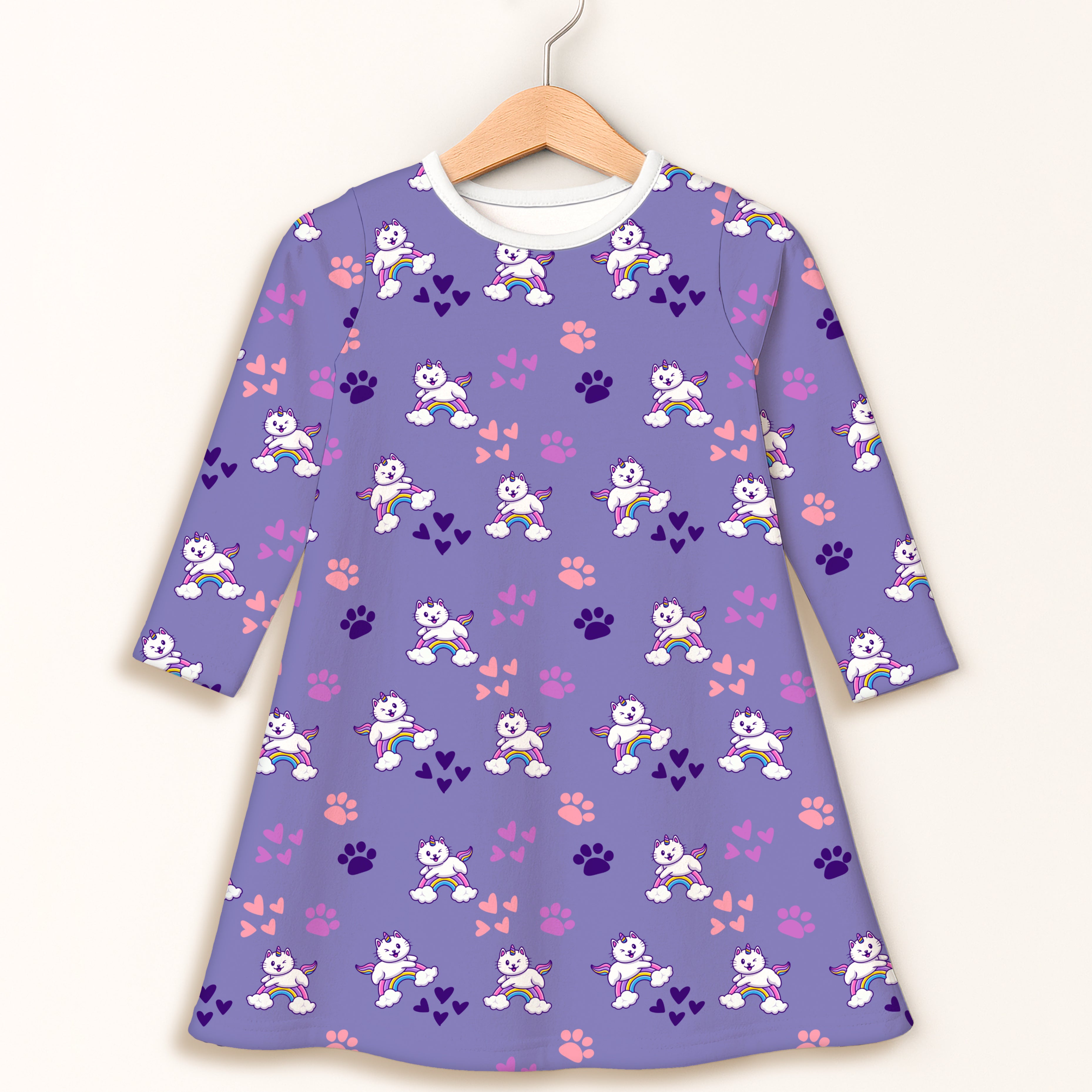 Girls purple caticorn long sleeve dress with white collar and playful winged cat, rainbow, paw print, and heart pattern