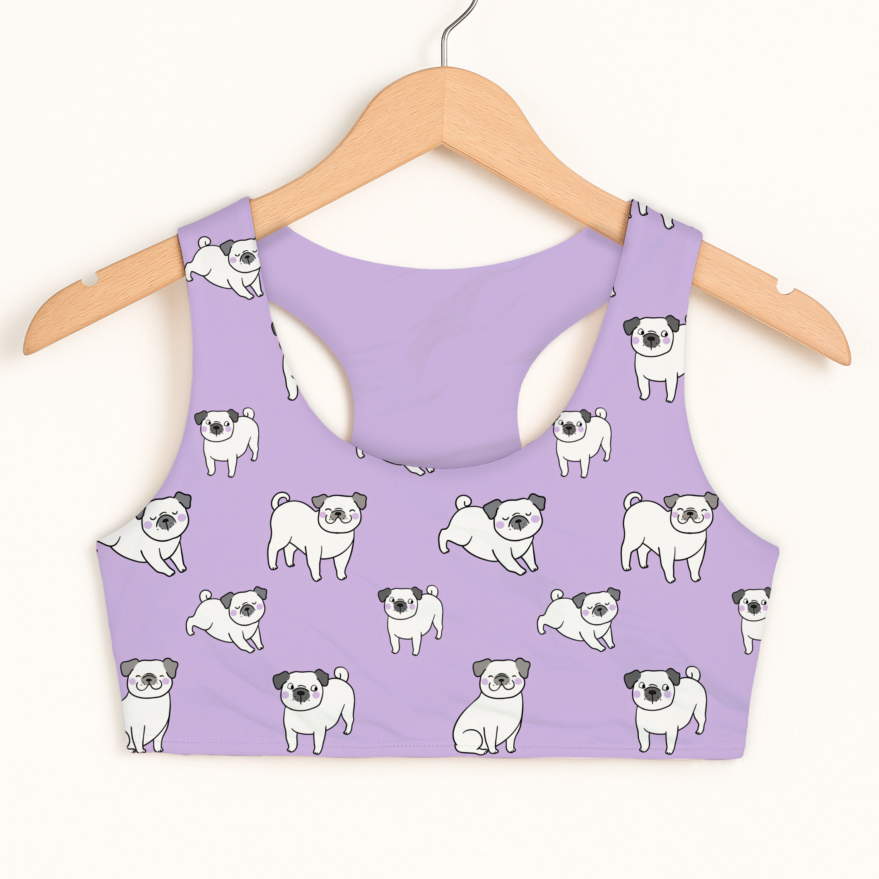 Girls purple pug sports bra with white pug pattern featuring black ears and nose quick drying double layered comfort