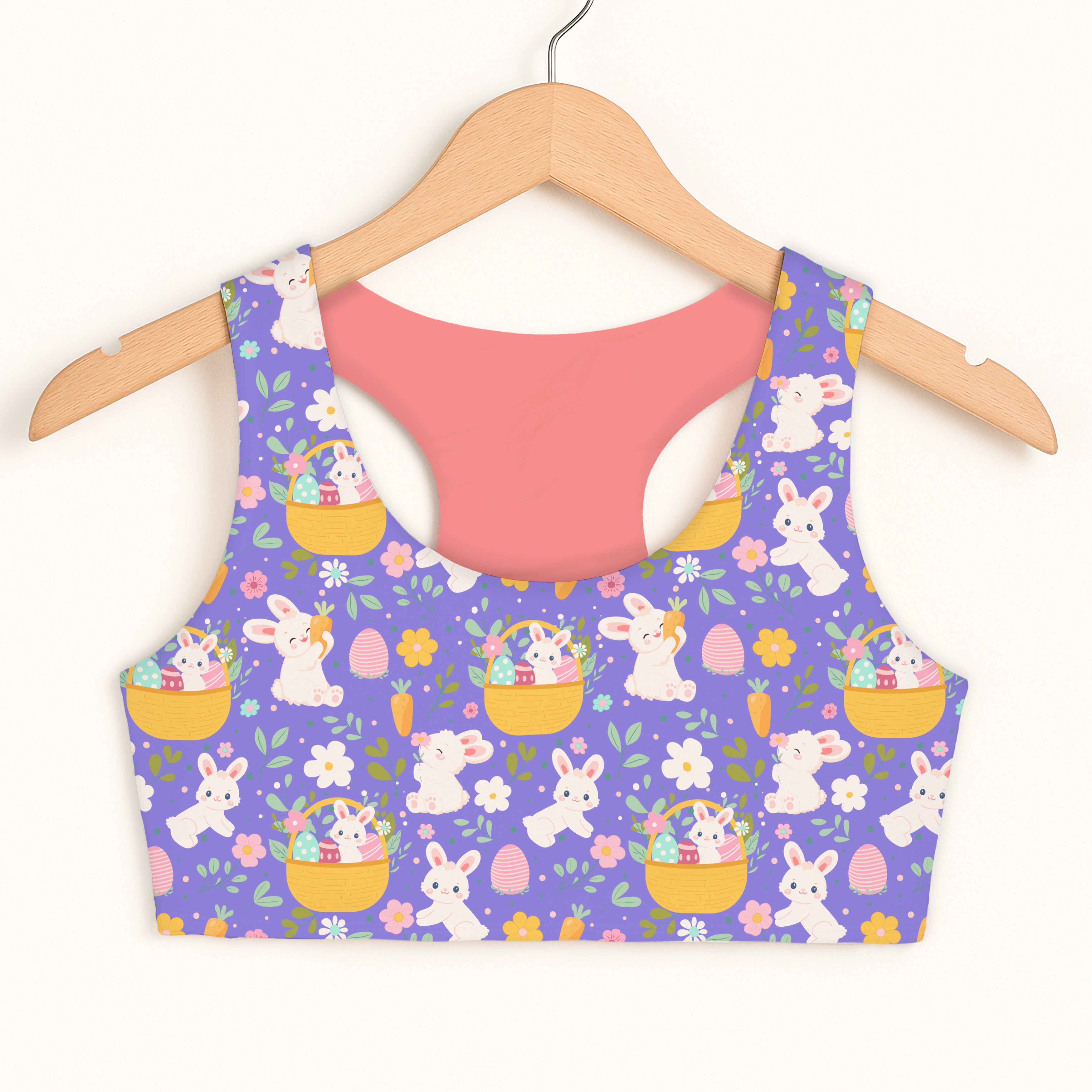 Girls purple Easter bunny sports bra featuring quick drying double layered comfort with white bunnies and pastel accents