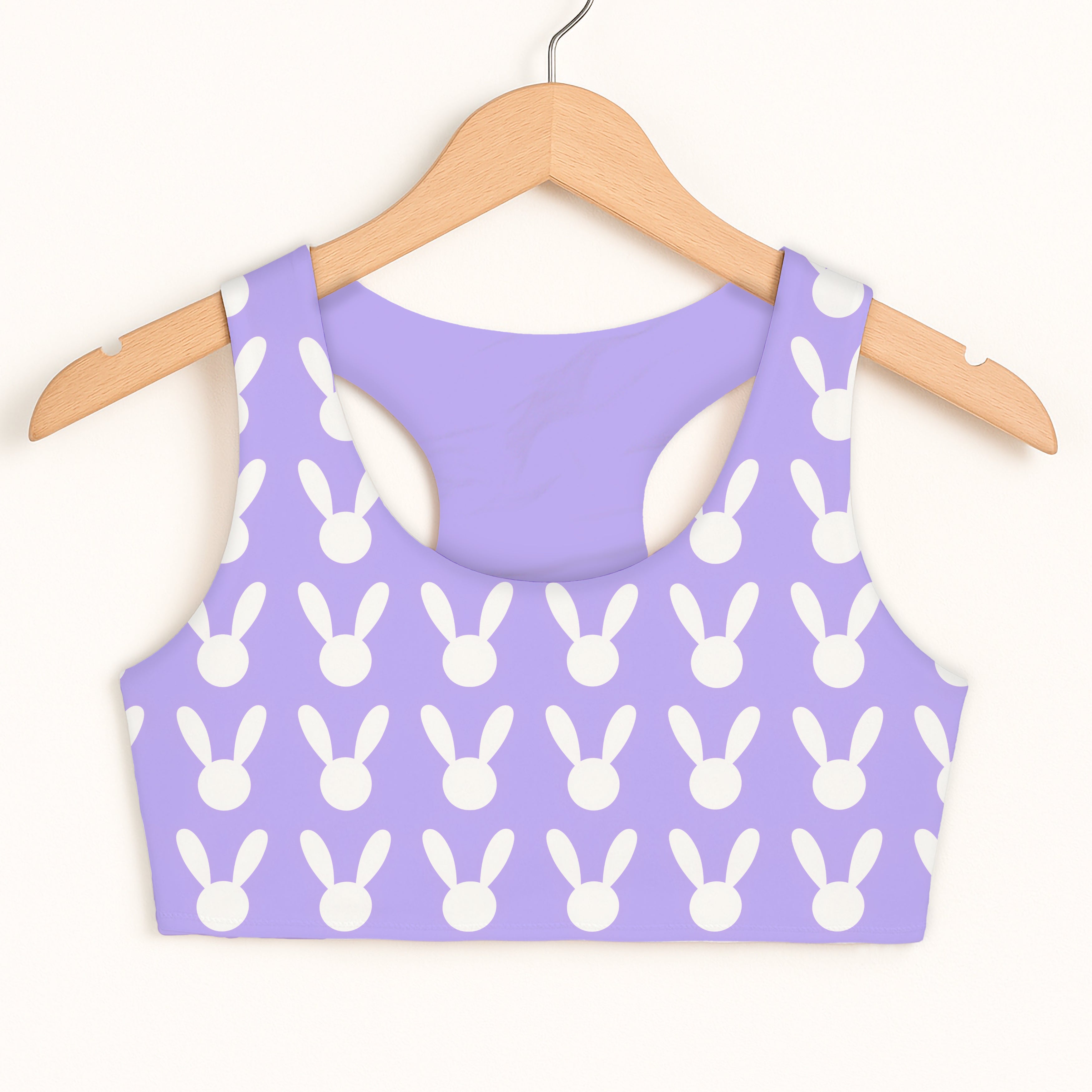 Girls purple bunny sports bra with white face pattern hanging on wooden hanger double layered quick drying comfort
