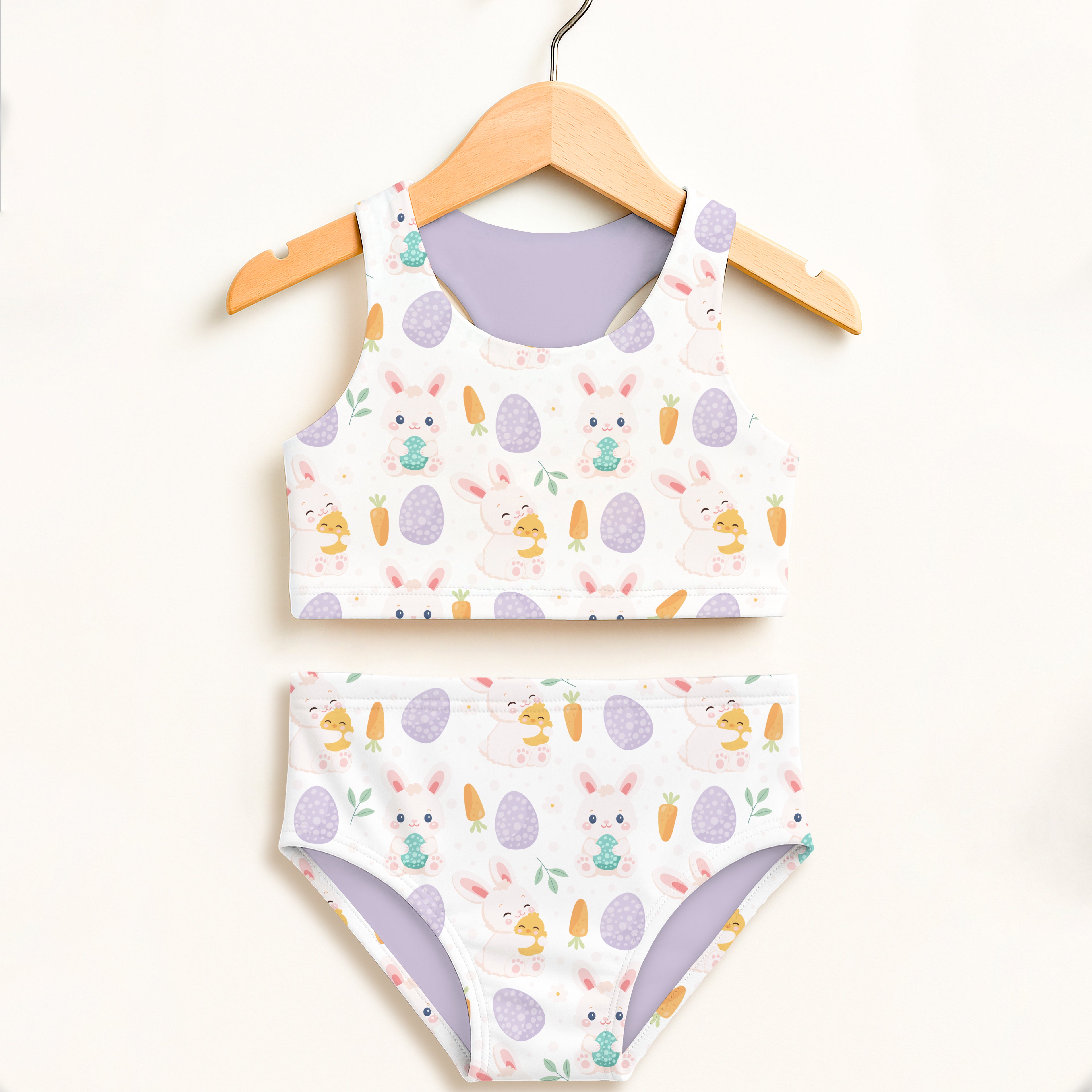 Girls white Easter bunny two-piece swimsuit with egg print and lavender lining double layered UPF 50+ high waisted comfort
