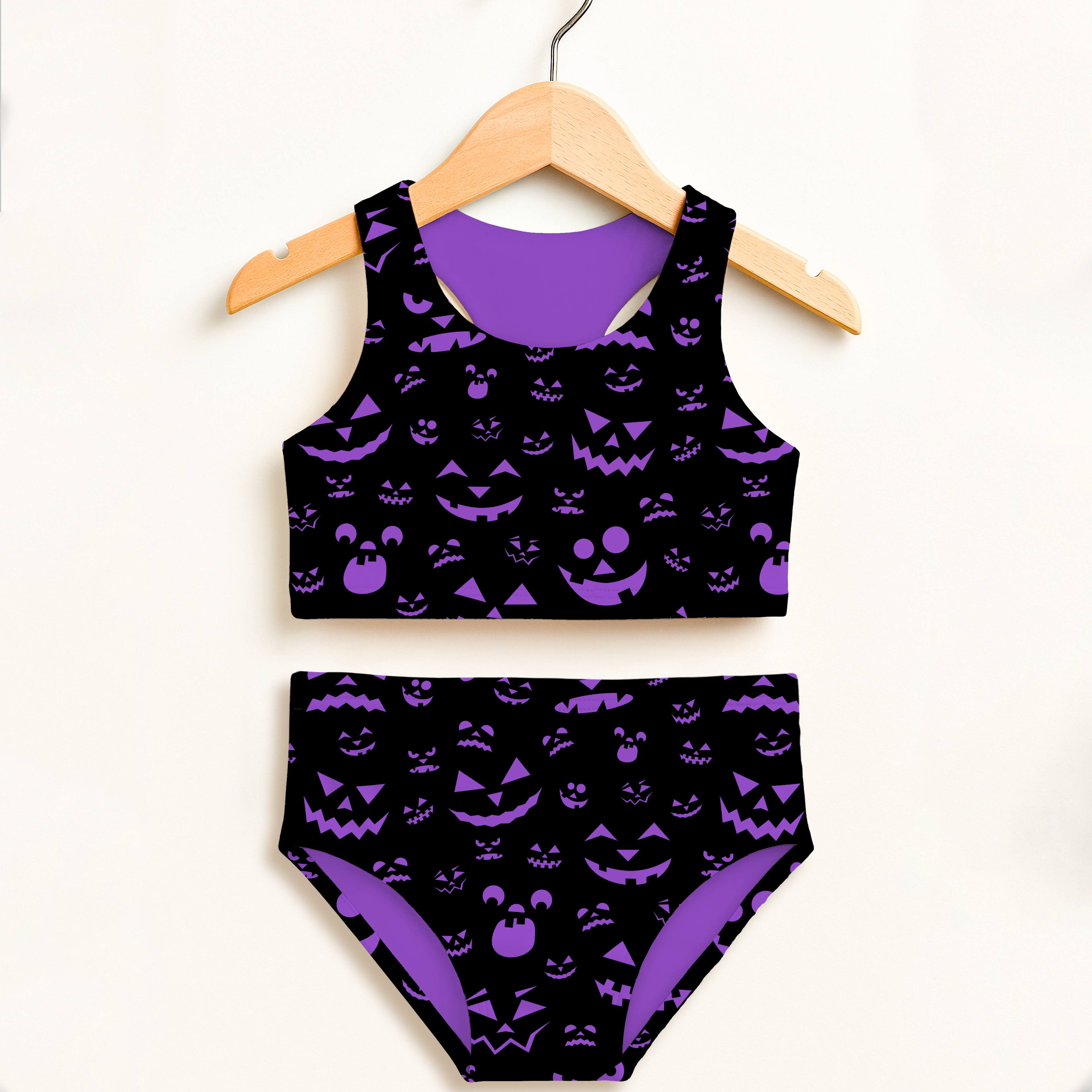 Girls purple jack-o-lantern halloween two piece swimsuit with playful print double layered upf 50 high waisted comfort