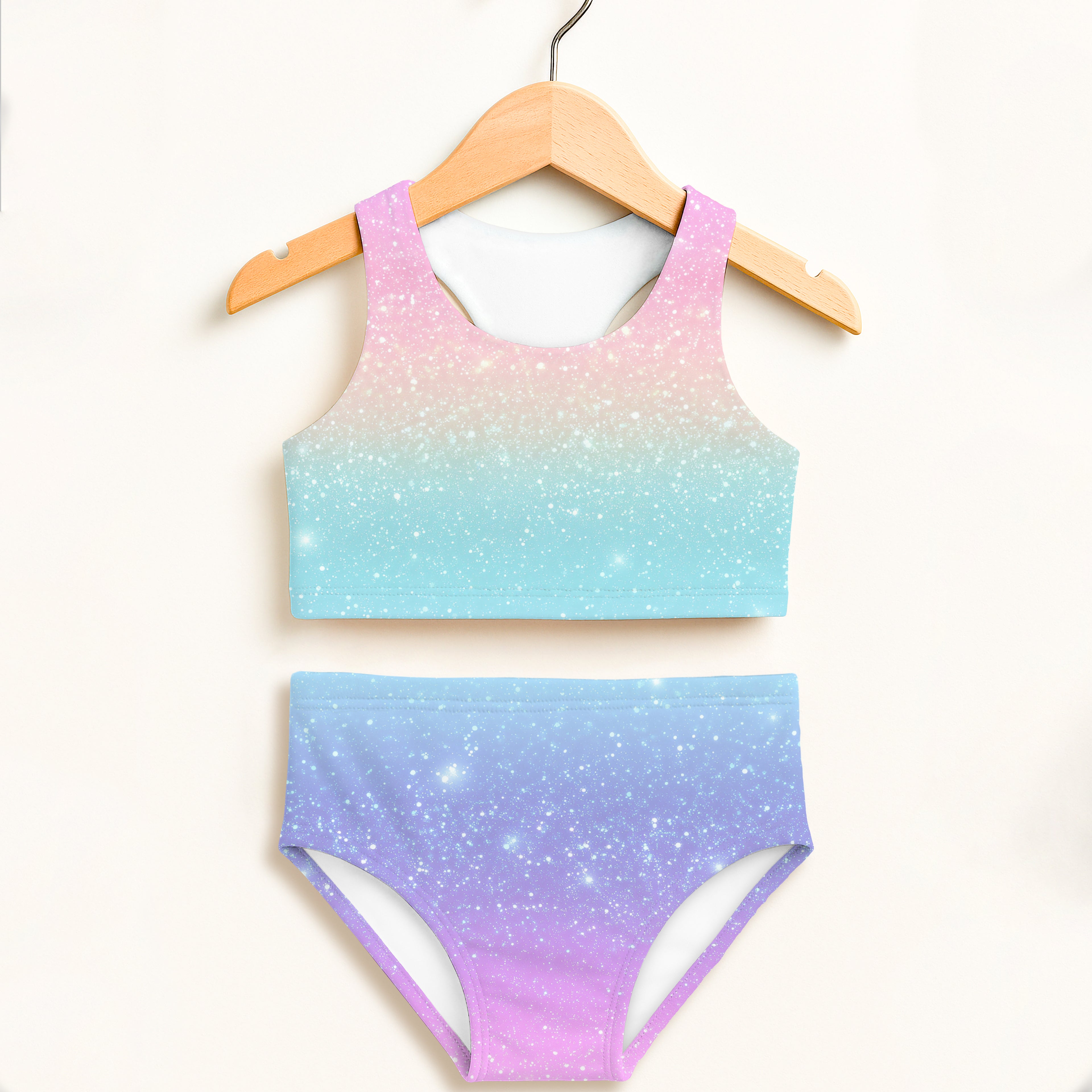 Girls faux sparkle effect rainbow two-piece swimsuit with pastel gradient starry sky on stretchy upf 50+ fabric